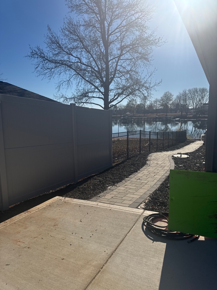 Denver, NC - A beautiful grey vinyl into black aluminum job done by Top Rail Fence here in Denver NC.