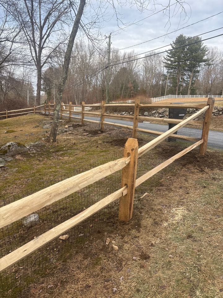 Bridgewater, CT - 2 and 3 rail locust split rail with mesh. Fashion and function 