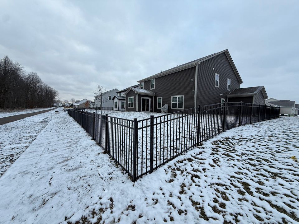 Carmel, IN - We installed this 4ft black aluminum fence in Westfield 