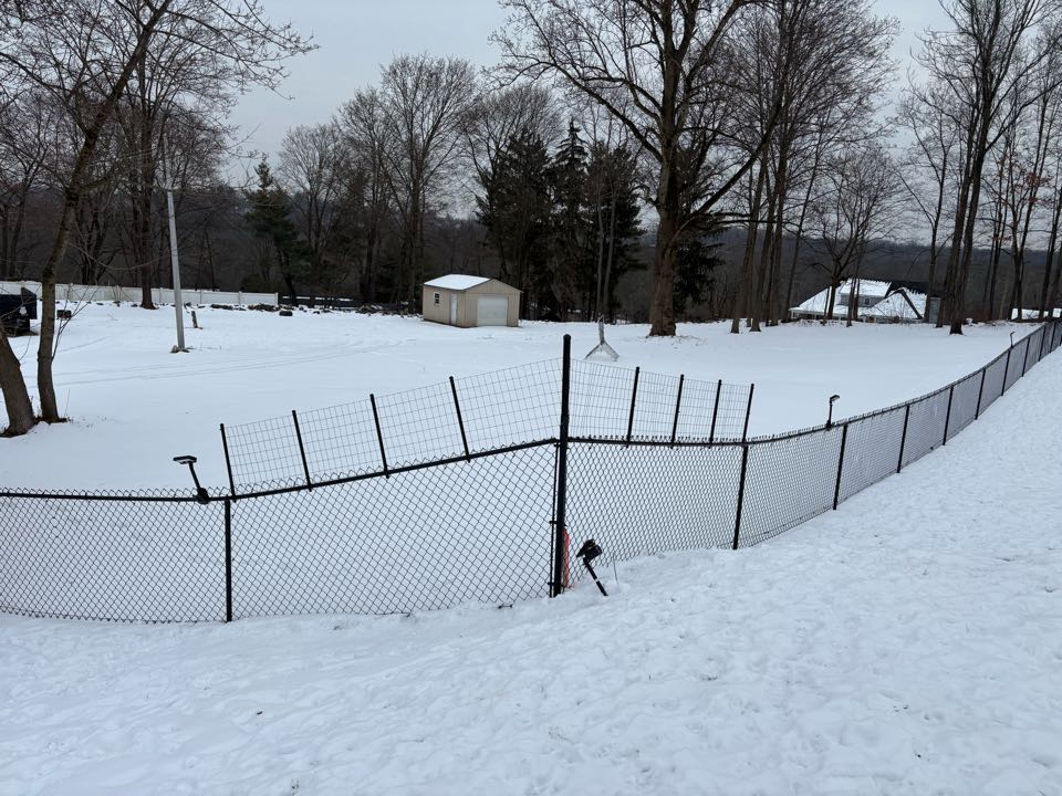 Berlin, CT - Custom fence height extension for the pups. 