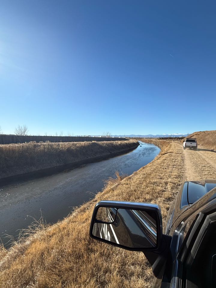 Commerce City, CO - Top Rail Fence is out in Henderson, Colorado doing estimates for 6H and 8H chain-link fencing around a private ditch. Call us today for your commercial and residential estimate needs!!