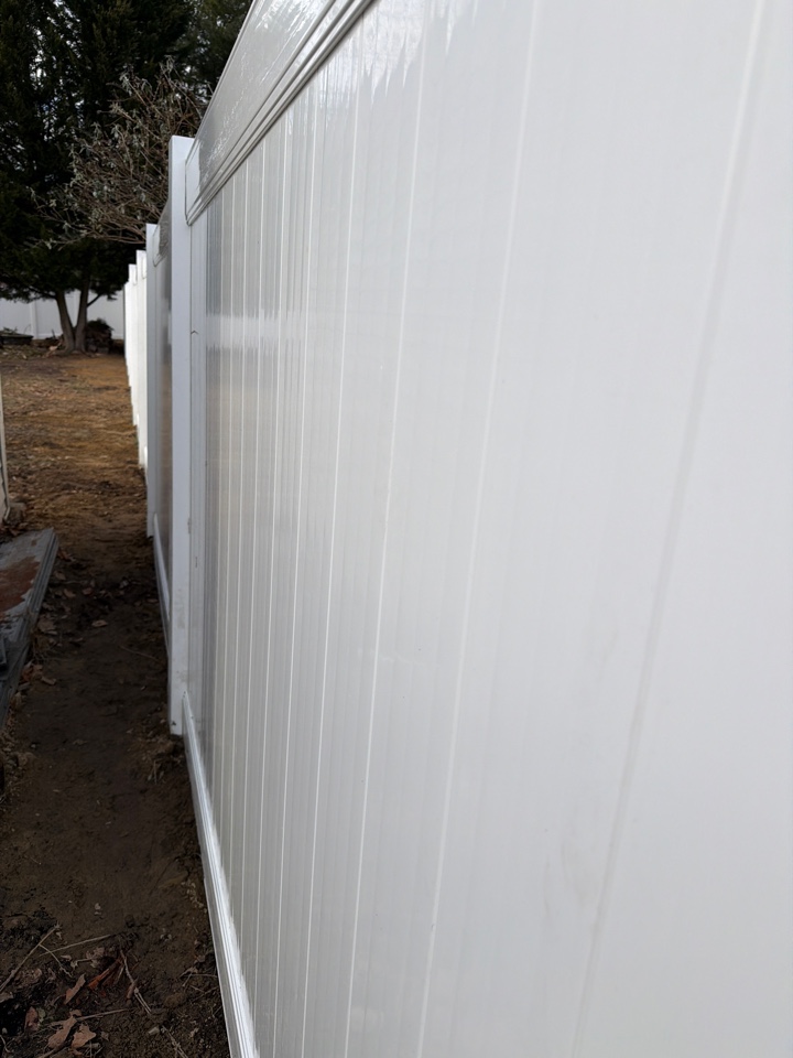 West Deptford, NJ - Putting the final touches on this monster vinyl pvc solid privacy install.
