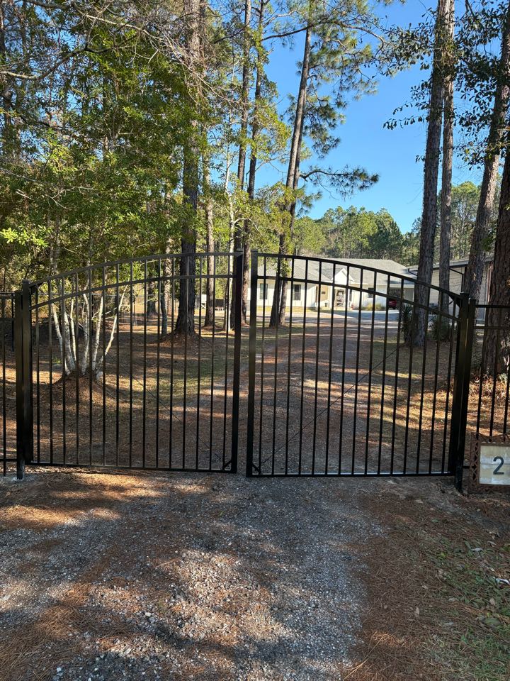 Milton, FL - Classy new 12’ Black Aluminum double gate that will be automated.  Use to be a chain link slide gate.  What an upgrade!!!