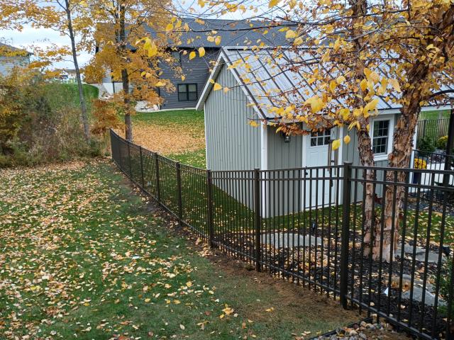 Hudsonville, MI - We successfully completed the initial phase of the fence project, installing a stunning textured bronze aluminum fence. 