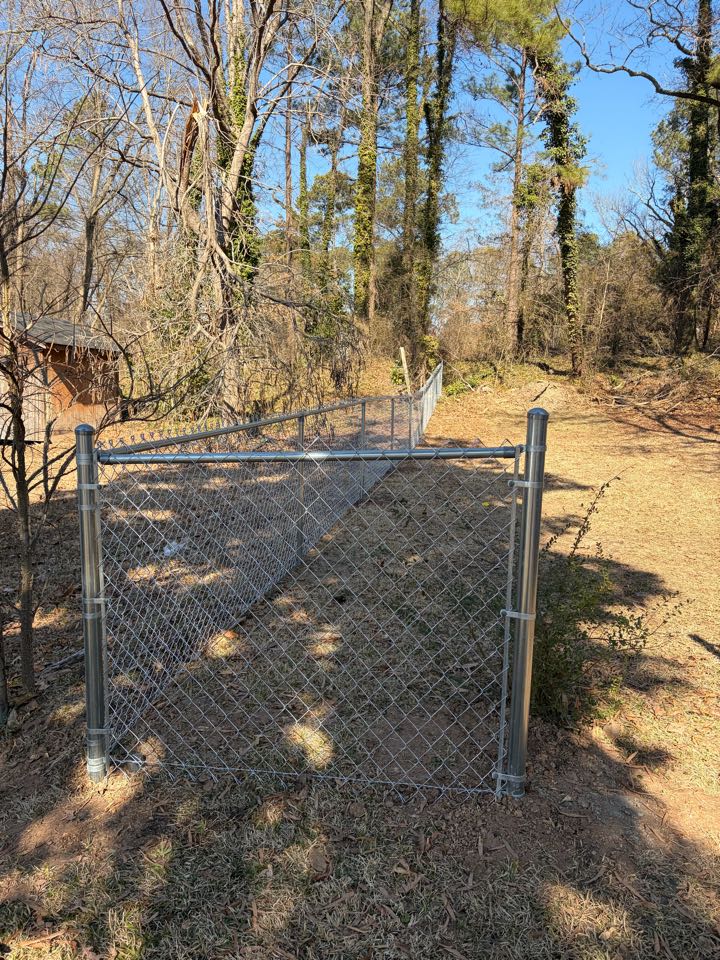 Durham, NC - Top rail chain link fence installation completed in our local area! 🐕 This durable chain link fence with top rail was installed to safely keep the family dog, Benji, inside while giving the homeowner peace of mind. Another successful fence project and another happy customer! If you’re searching for chain link fence installation near you, dog-friendly fencing, or a trusted local fence contractor, we’re proud to serve your area with quality workmanship.