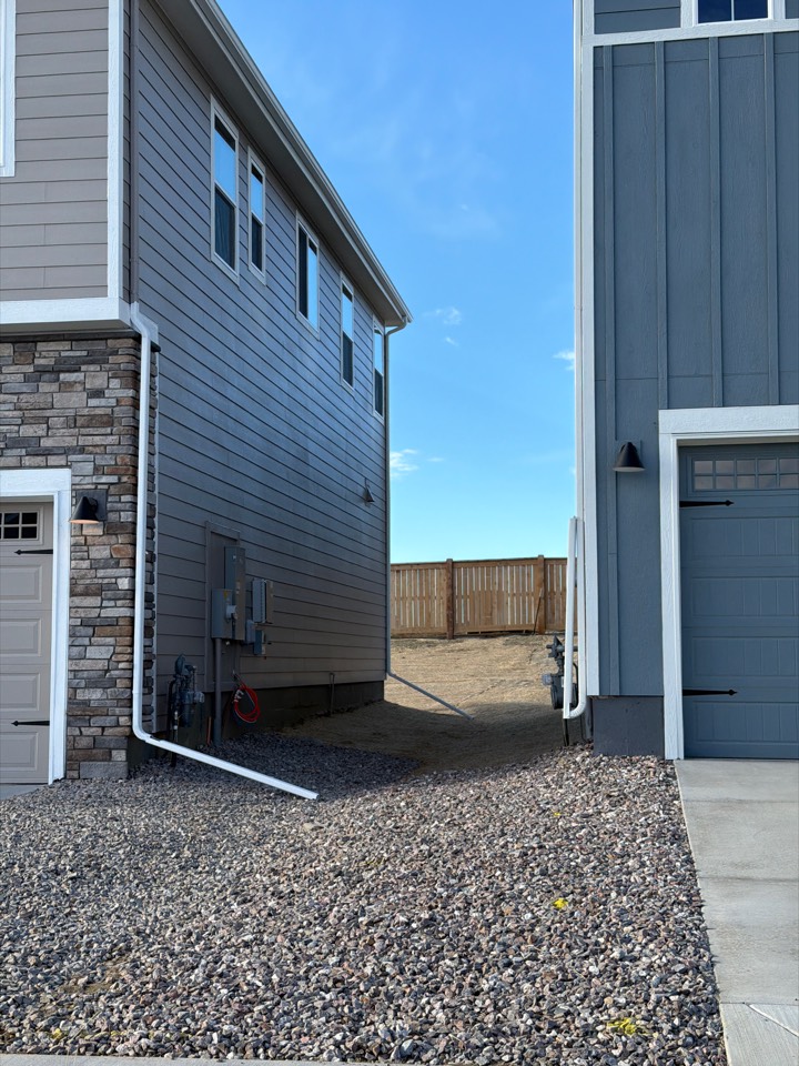 Parker, CO - Top Rail Fence is giving an estimate to a new homeowner for a 6 height premium cedar privacy fence.