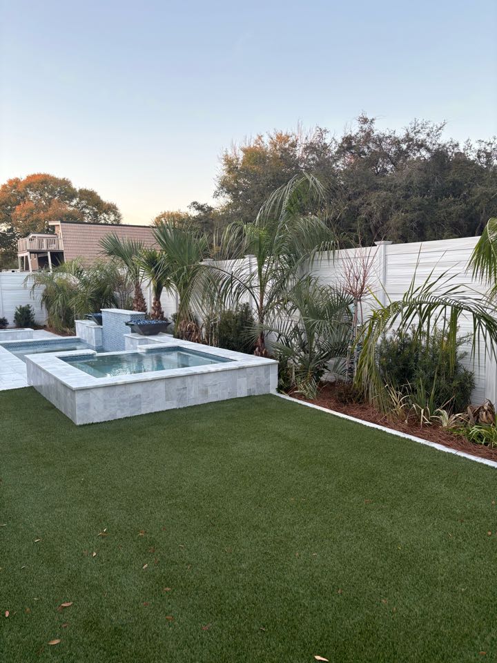 Milton, FL - A beautiful 12 foot automated aluminum gate. It replaced a chain-link gate! What a transformation!