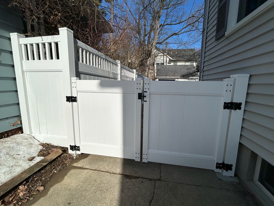 Ann Arbor, MI - At Top Rail Fence Ann Arbor we accomodate our customer needs.  With this Vinyl Fence install we had two neighbors that went in together to put in a beautiful fence to divide their Ann Arbor property.