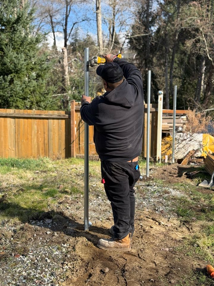 Seattle, WA - Cutting down posts for chain link in west seattle today.
