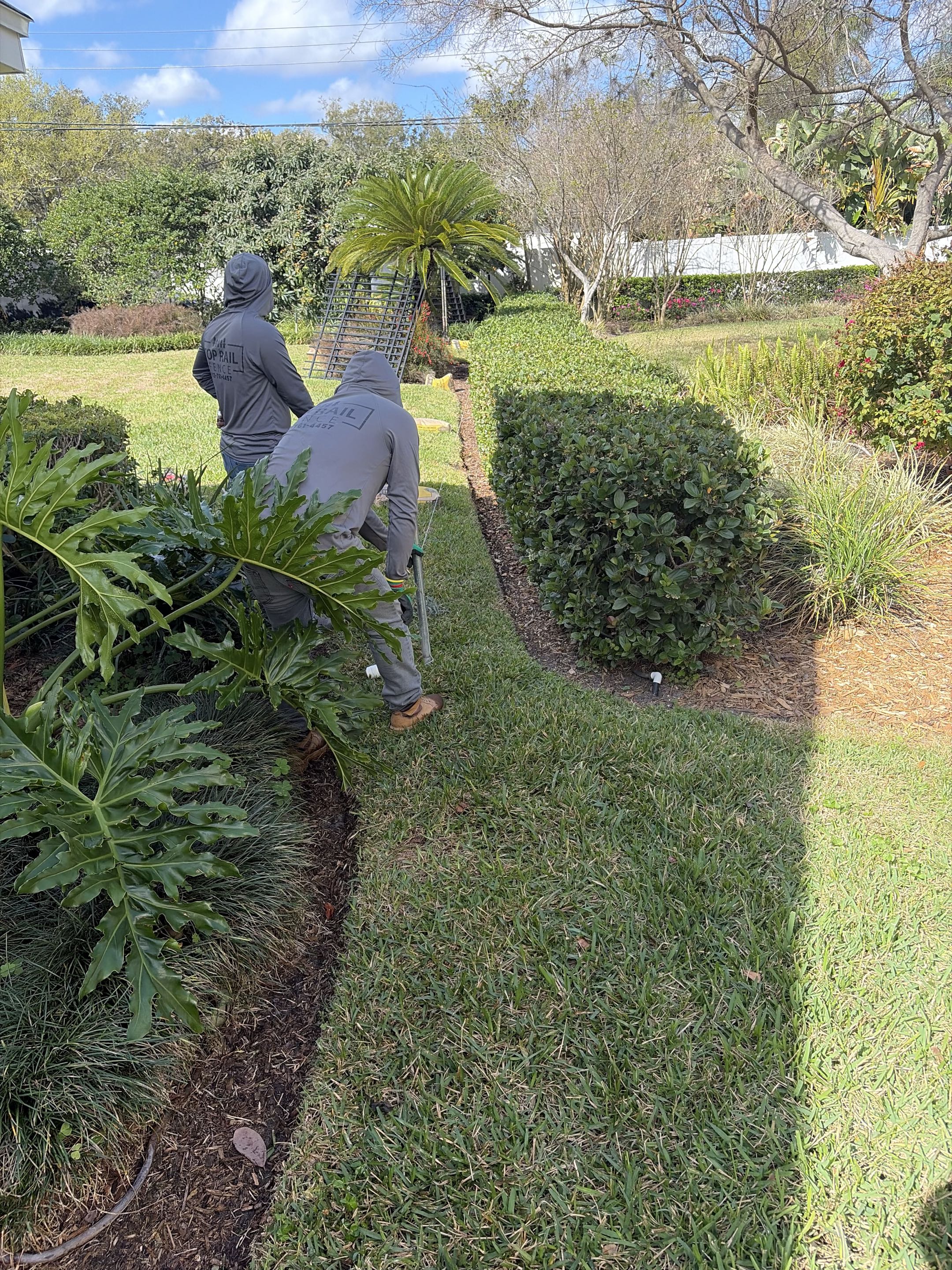 Tampa, FL - Setting up to build this beautiful black aluminum fence here in Carrollwood