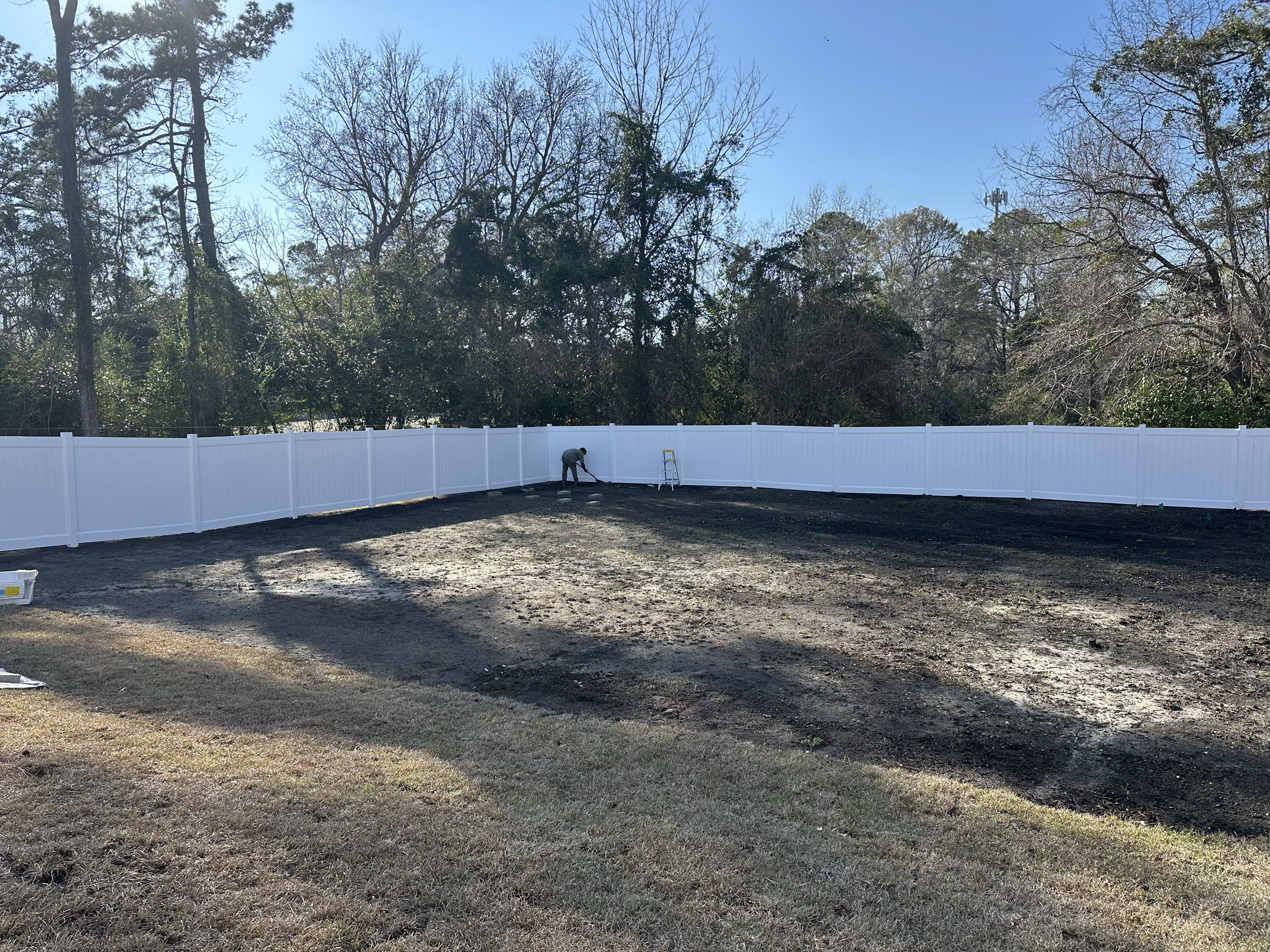 Wilmington, NC - Pretty new white vinyl fence install!  