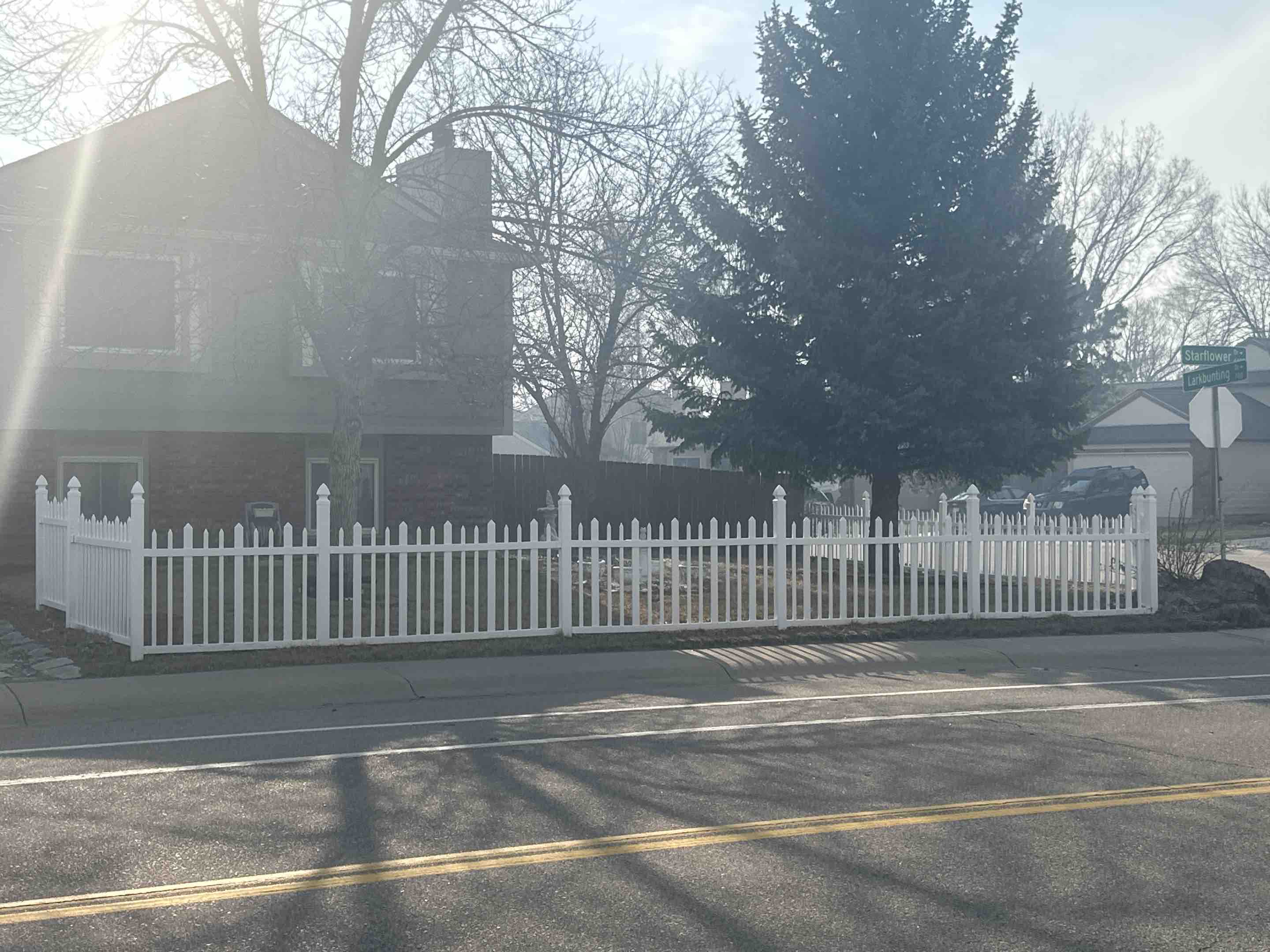 Fort Collins, CO - New alternating picket semi privacy vinyl fence with Gothic cap post, in Fort Collins, Colorado