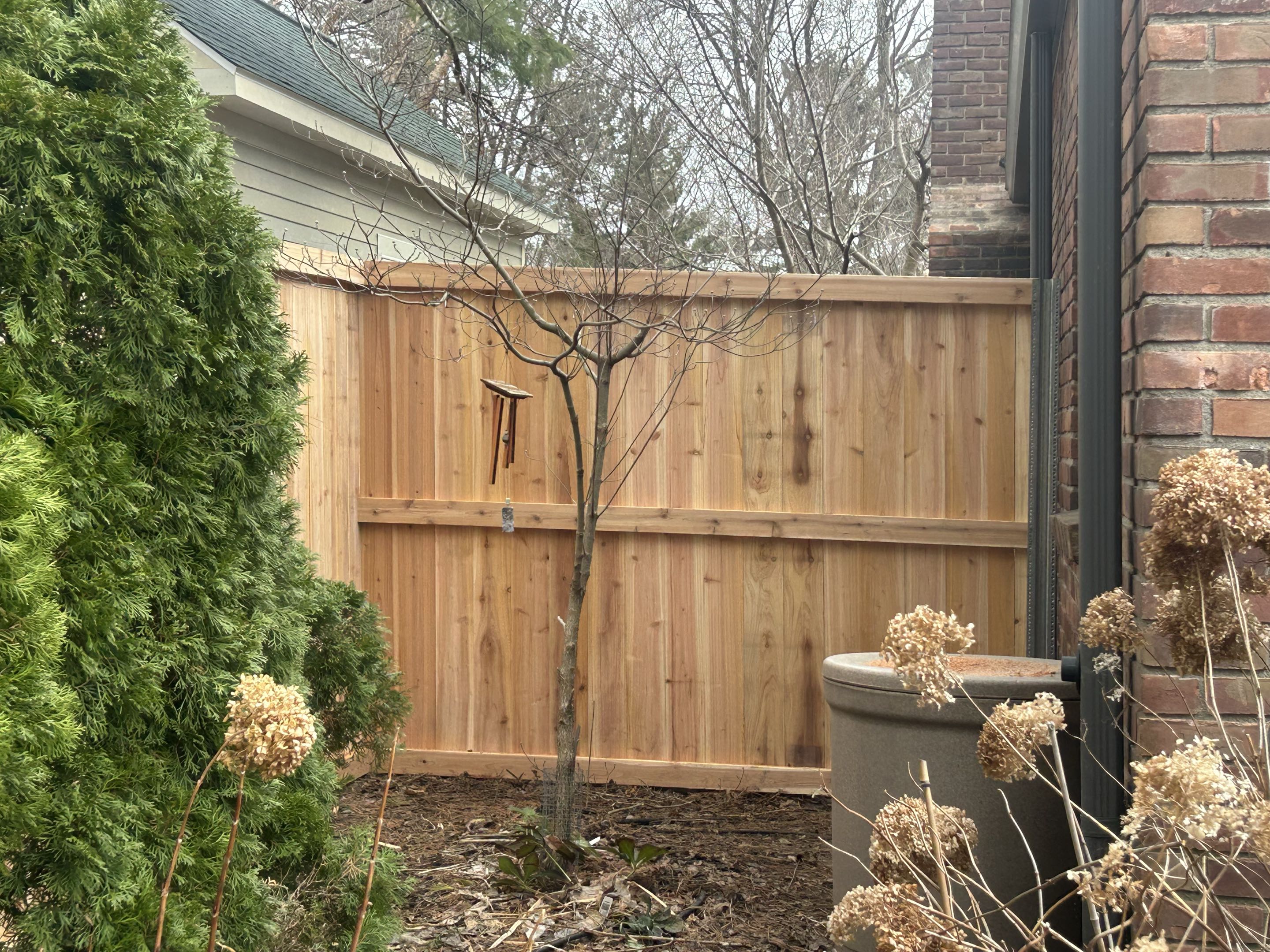 Ann Arbor, MI - Top Rail Fence is in Ann Arbor installing a beautiful cedar fence with postmasters.  This forever fence is built to last