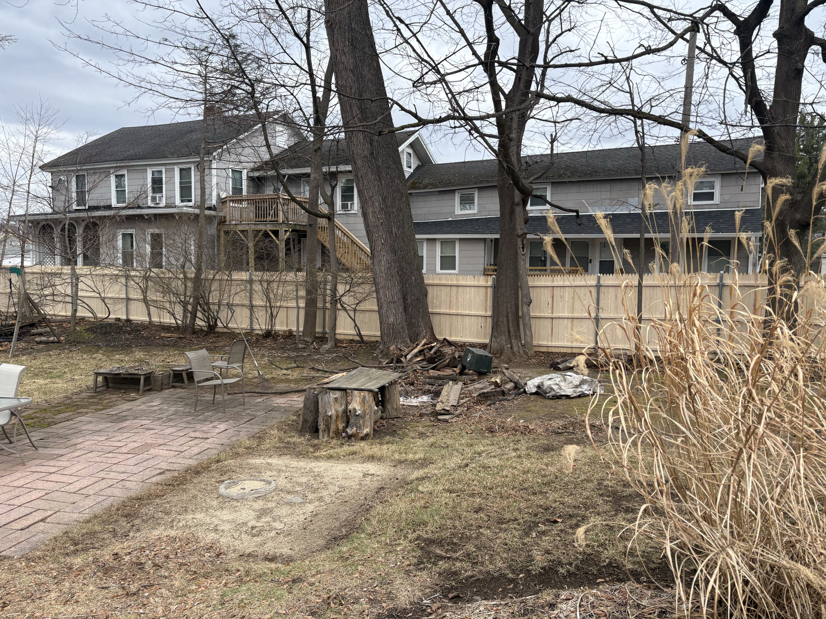 Bristol, CT - Wood fence with metal posts.