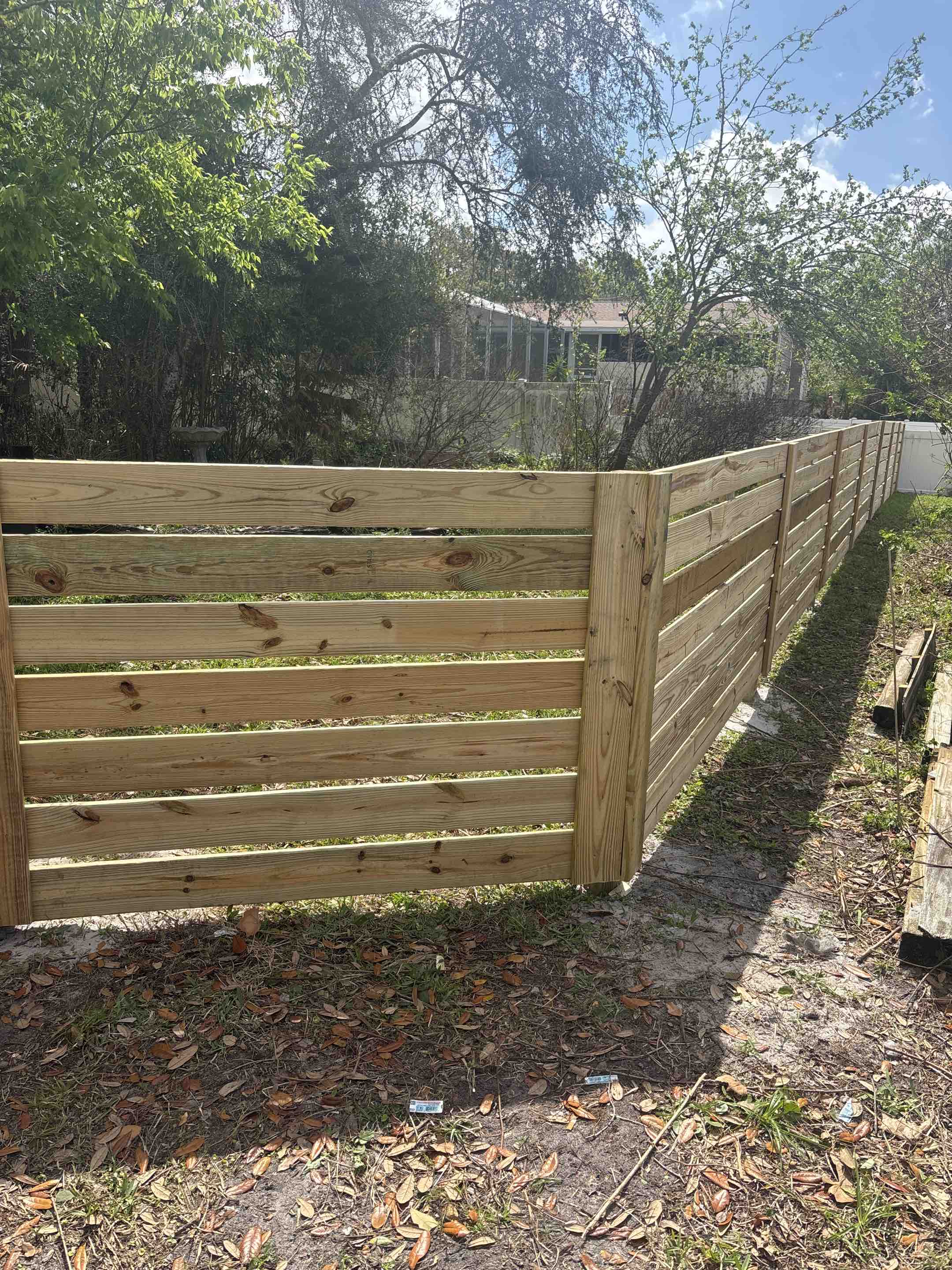 Port Orange, FL - 4’ height horizontal wood fence installed in port orange. 