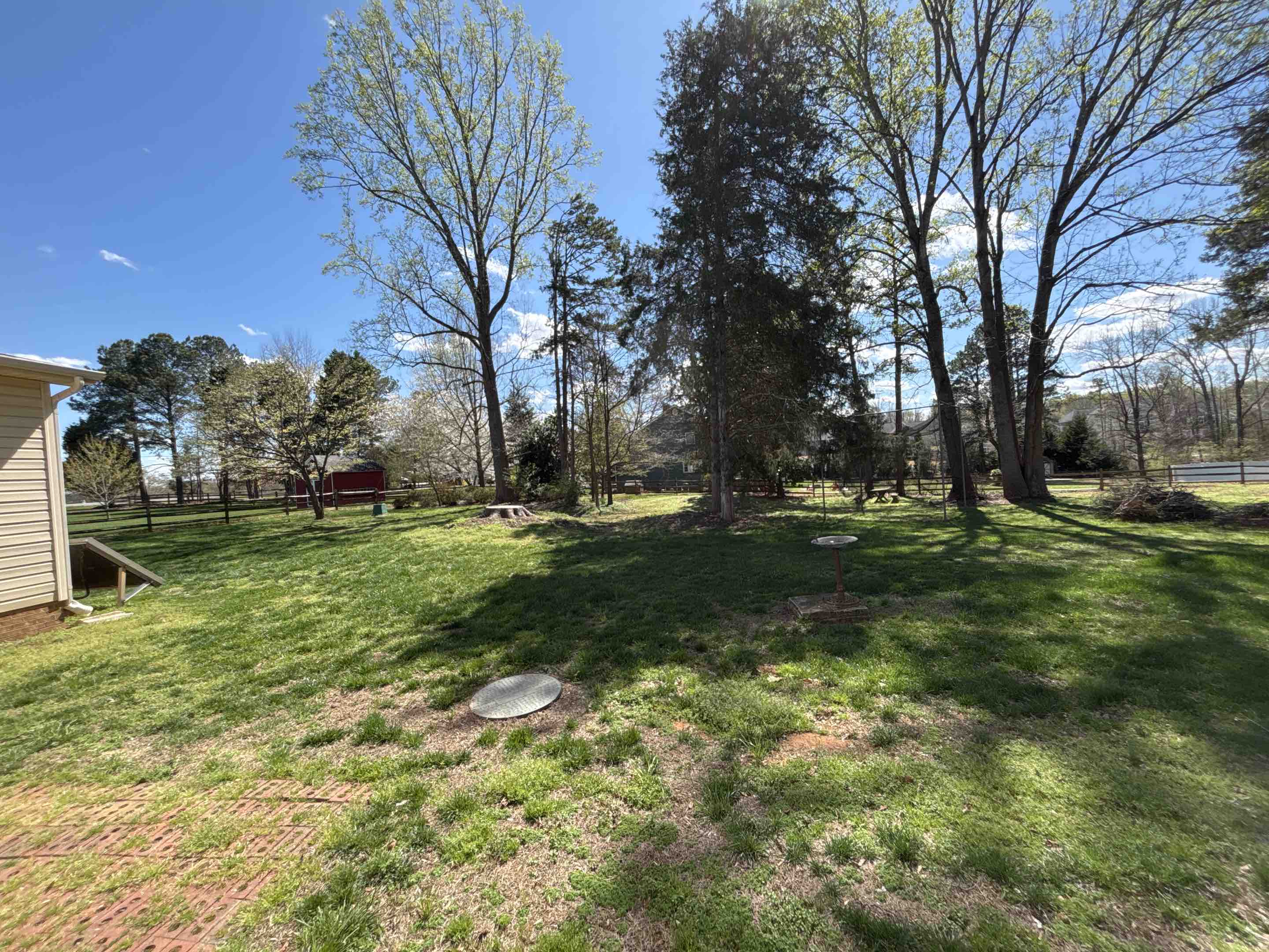 Harrisburg, NC - Replace the split rail with 6 foot vinyl