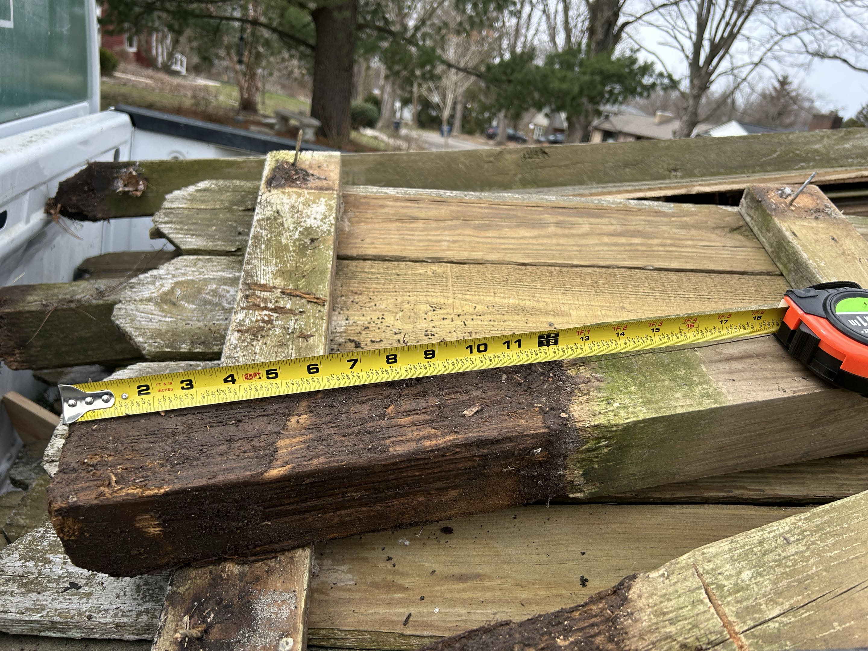 Ann Arbor, MI - Top Rail Fence Ann Arbor is near Stadium Blvd today. A nice lady called about a 12 foot section of wood fence that was knocked down by the wind.  I told her I’d do it for free if her neighbor went with my bid.  It wasn’t hard to tear out…