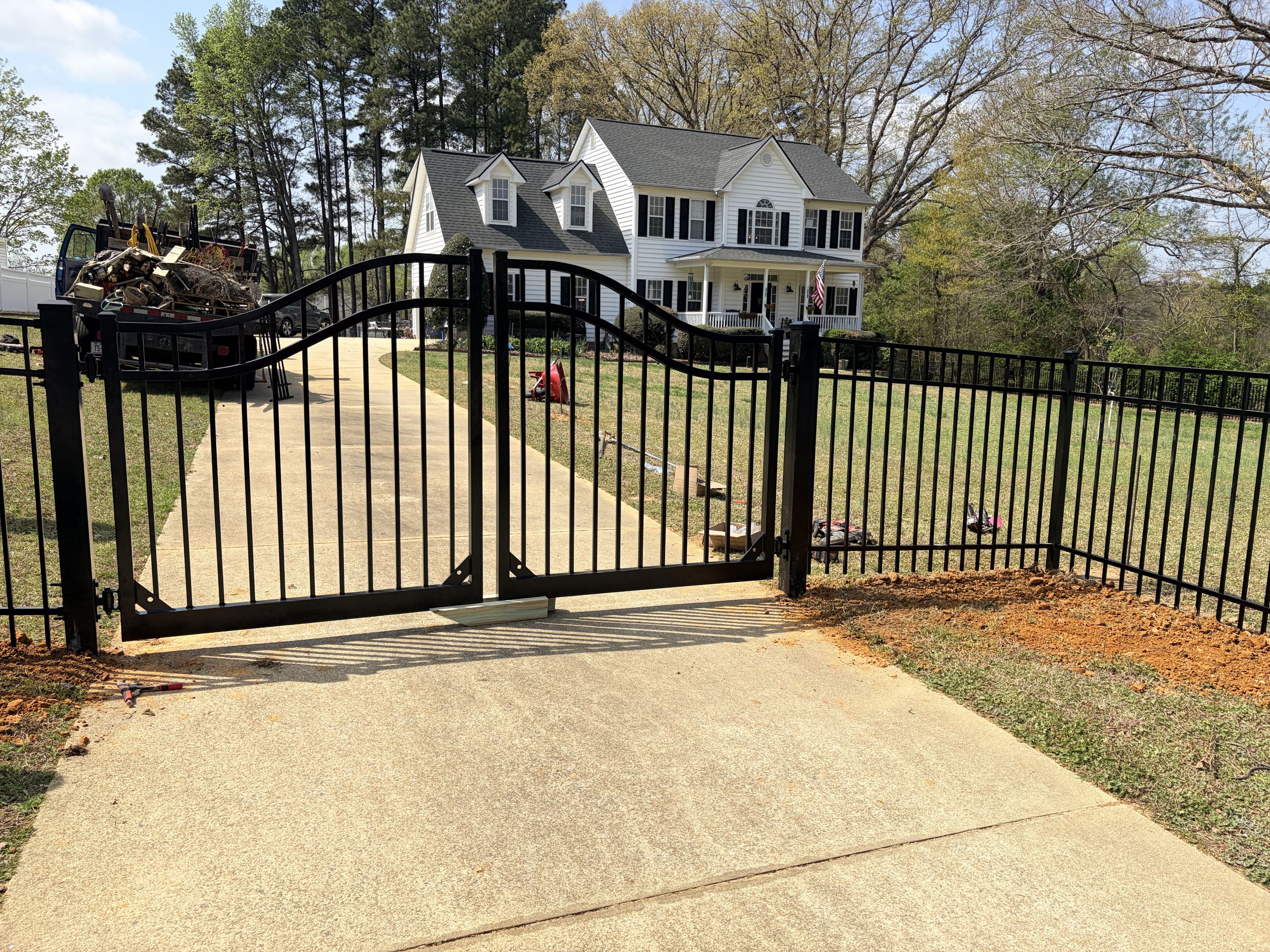 Raleigh, NC - Over 700 feet of aluminum fence and an automatic gate installed on this gorgeous property 