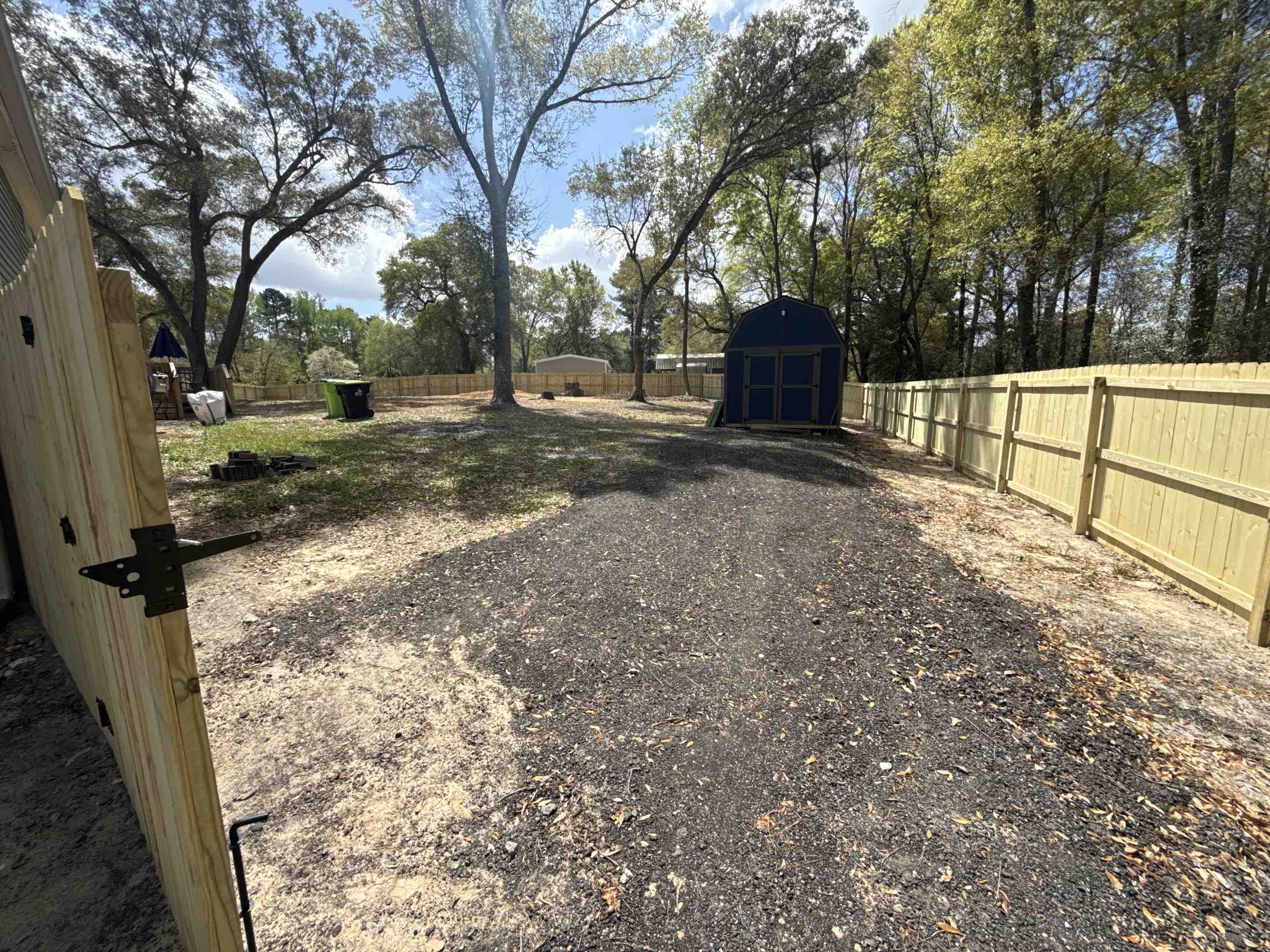 Leland, NC - We successfully installed 400 feet of high-quality stockade fencing in just one day! transforming the backyard into a private oasis!