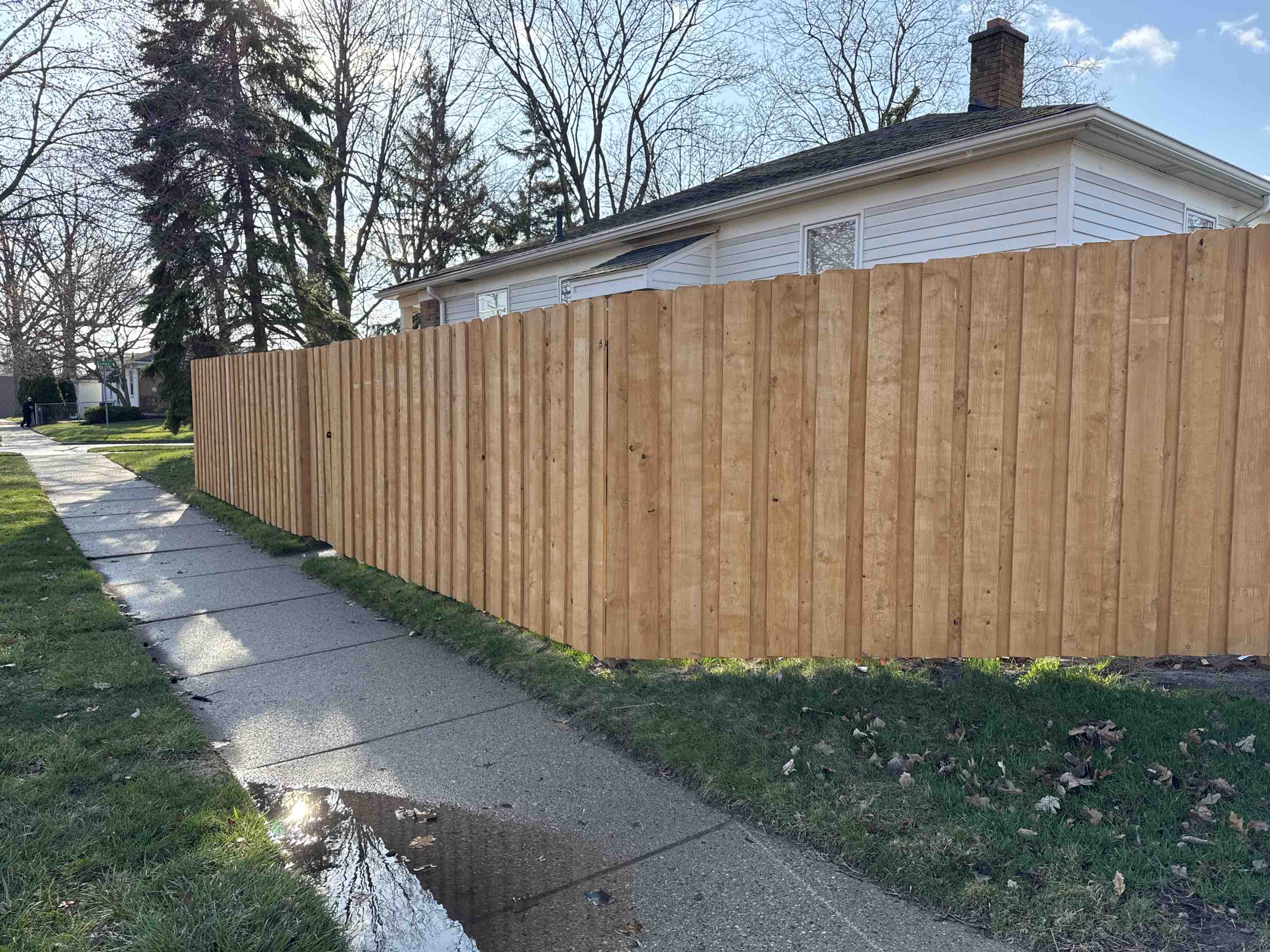 Royal Oak, MI - Our install team completed a beautiful 6 foot tall cedar tone board on board wood privacy fence in Royal Oak, Michigan