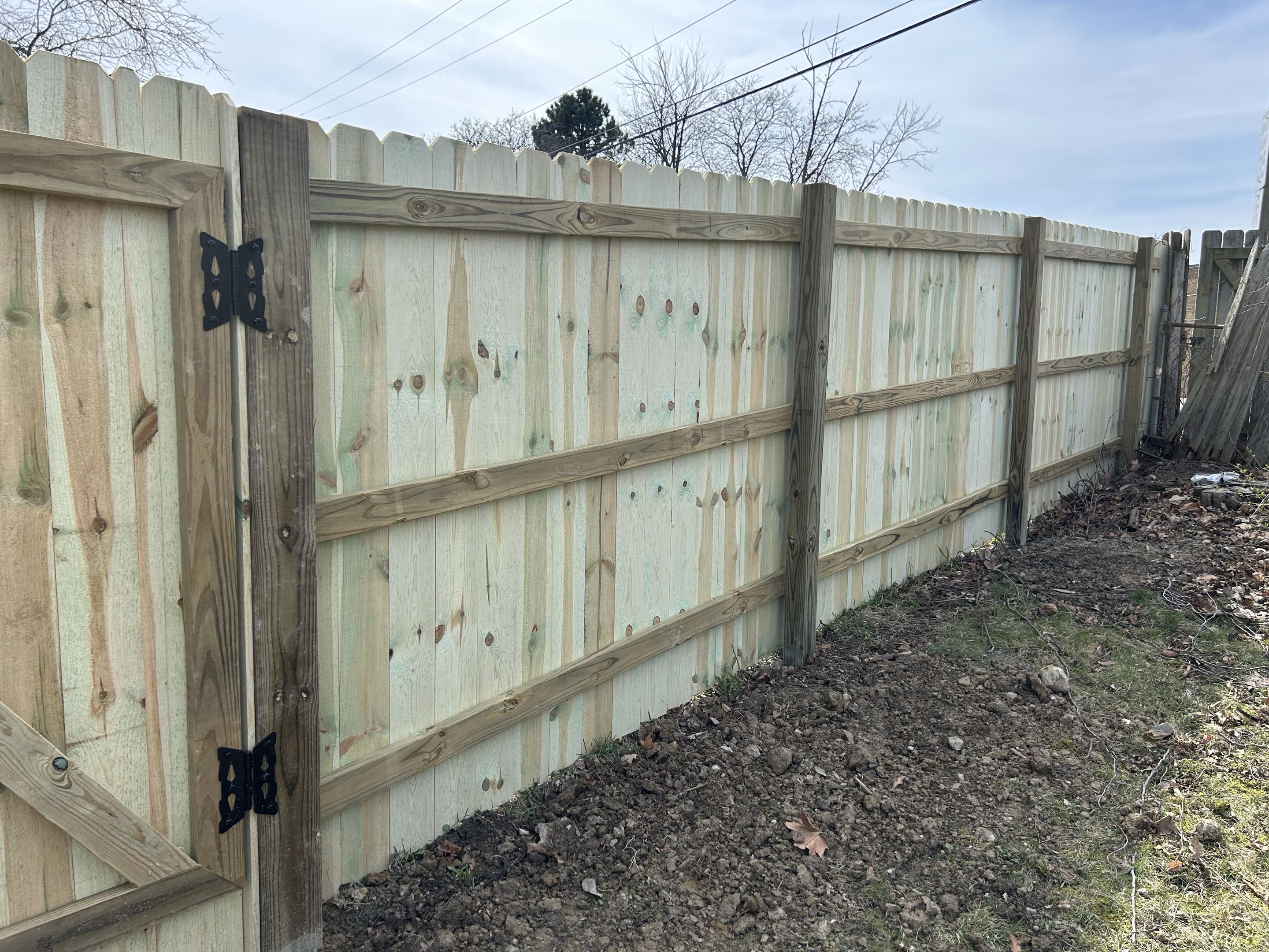 Ann Arbor, MI - Top Rail Fence was along Plymouth Rd and completed this amazing dog ear picket fence.  This replaces a fence that was decays and crumbling