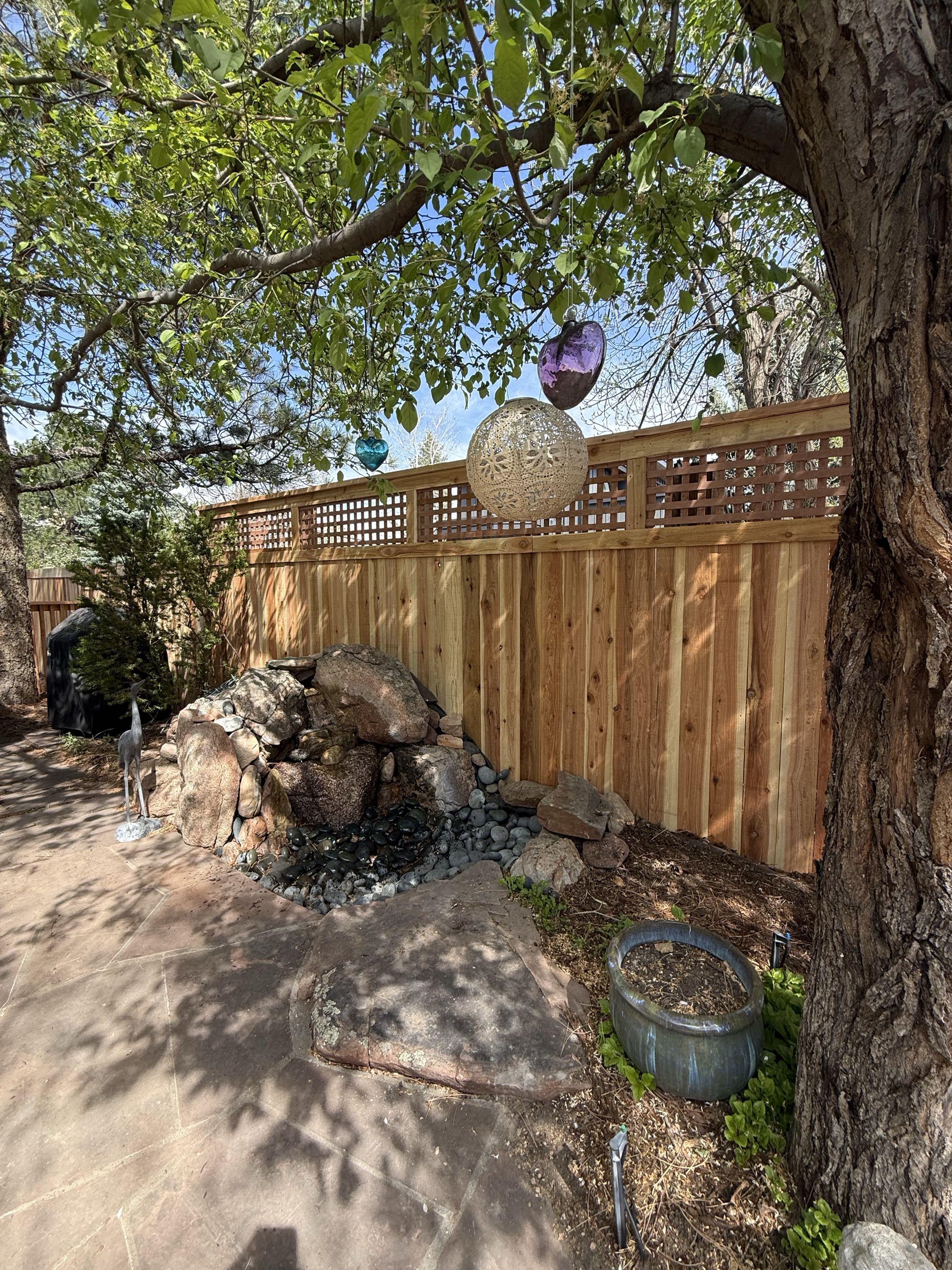 Boulder, CO - Top Rail Fence just completed a beautiful Fence Replacement in Boulder Colorado. The client was looking for more privacy between neighbors and more unique way to partition off their yard and it turned out beautifully! We went with a lattice fence for the added privacy and railing style partition to keep the dog in. 