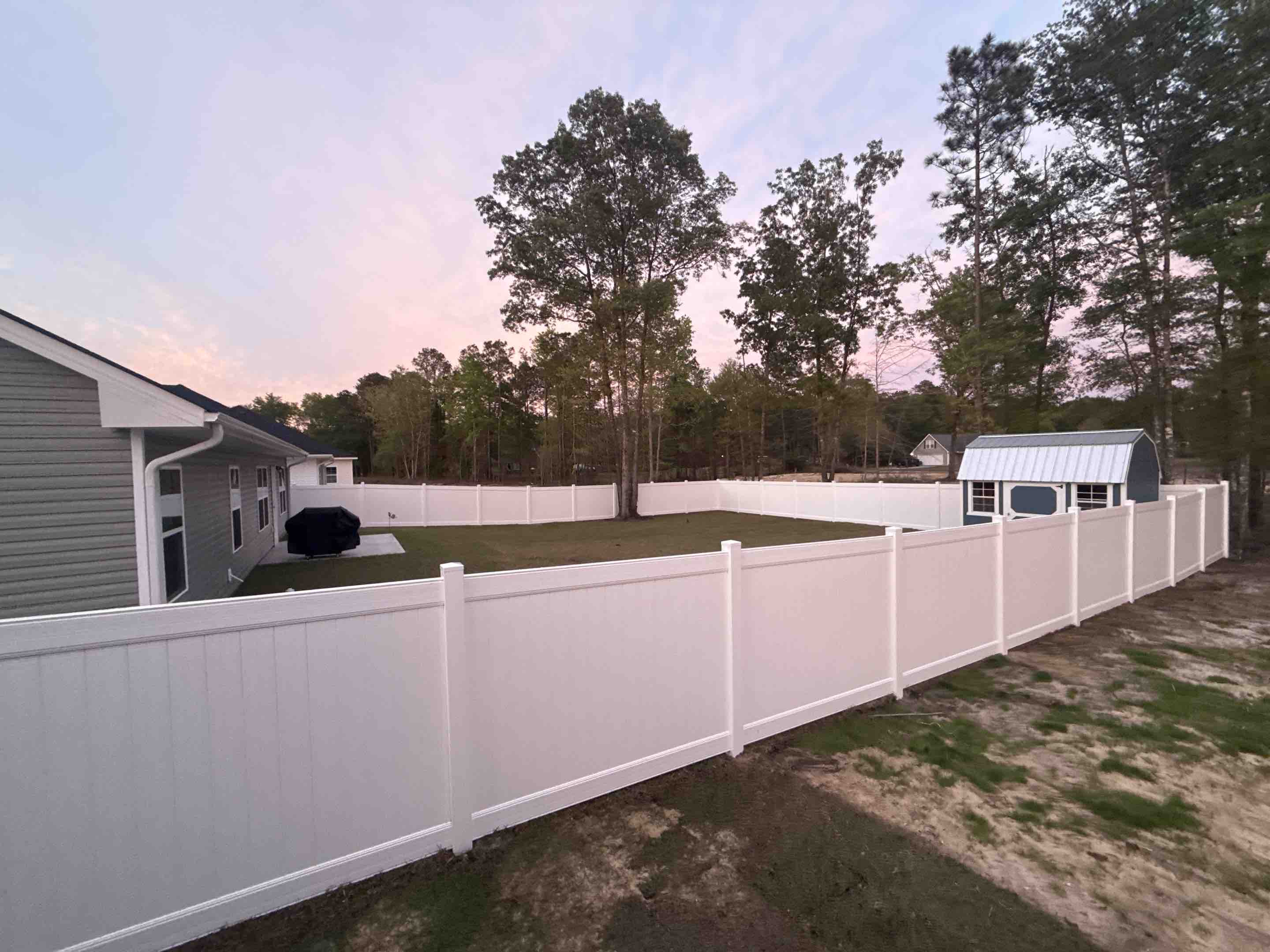 Leland, NC - 318ft of 6ft vinyl in one day! Beautiful fence, amazing work team! 