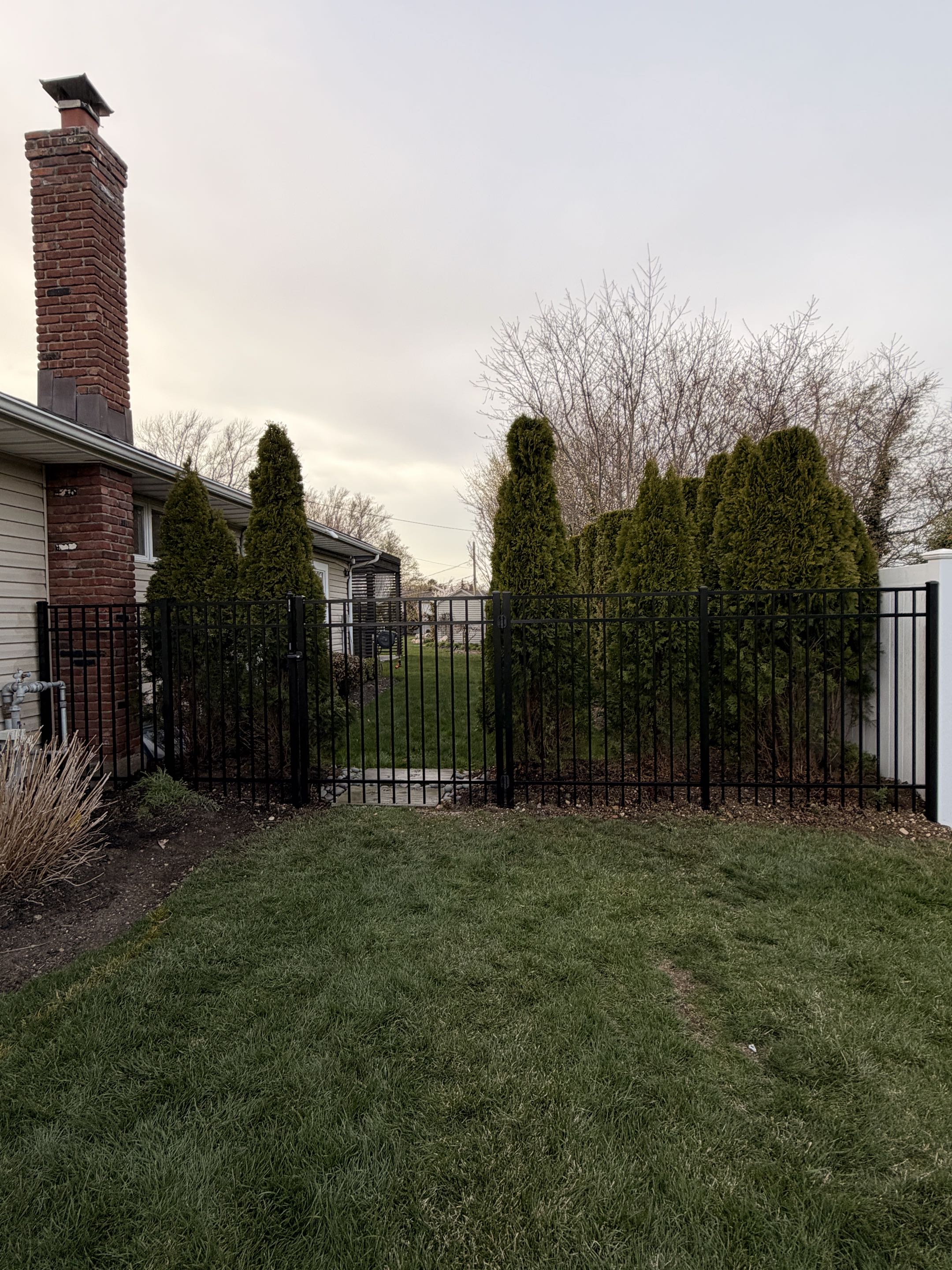 Commack, NY - Installed a 5’ aluminum pool code compliant fence for a beautiful home in Commack, NY. Safe, clean, and built to last while enhancing the property’s look and outdoor vibe.  #CommackNY #PoolFence #AluminumFence #FenceInstallation #CodeCompliant #TopRailFence #SuffolkCounty #LongIslandHomes
