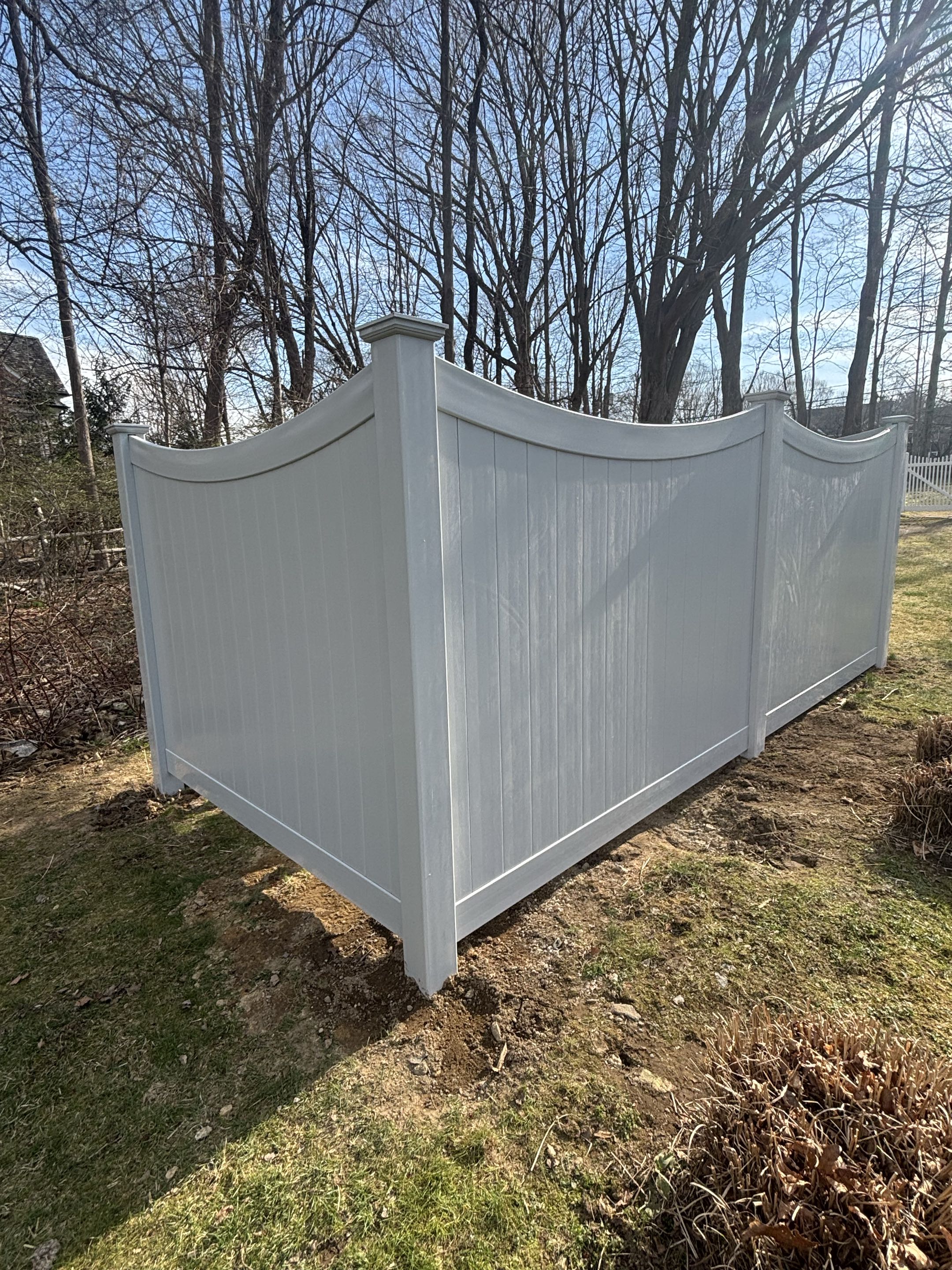 Wilton, CT - Charming grey scalloped top vinyl to hide the pool equipment. 