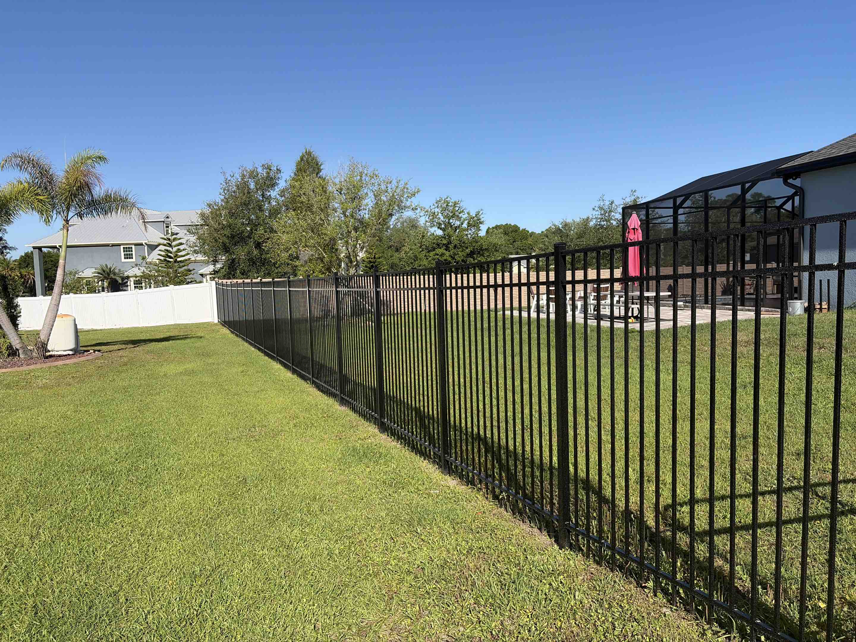 Odessa, FL - We’ve constructed this sleek black aluminum fence for this family in Odessa, it’s the perfect style if you’re looking for no maintenance and you want to keep the view! 😎