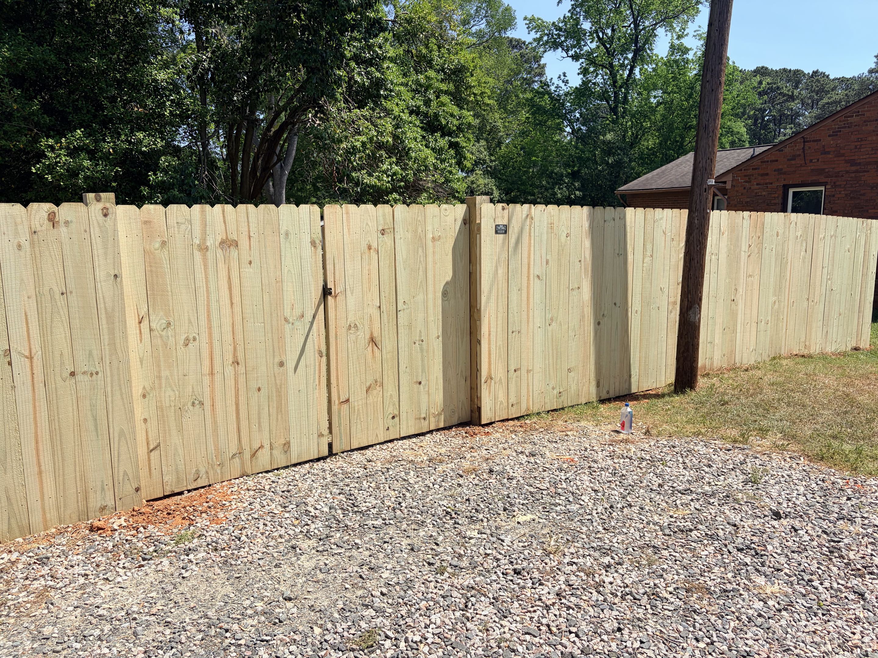Raleigh, NC - A new chain link section after a tree fell on it and a new privacy fence to increase curb appeal! 