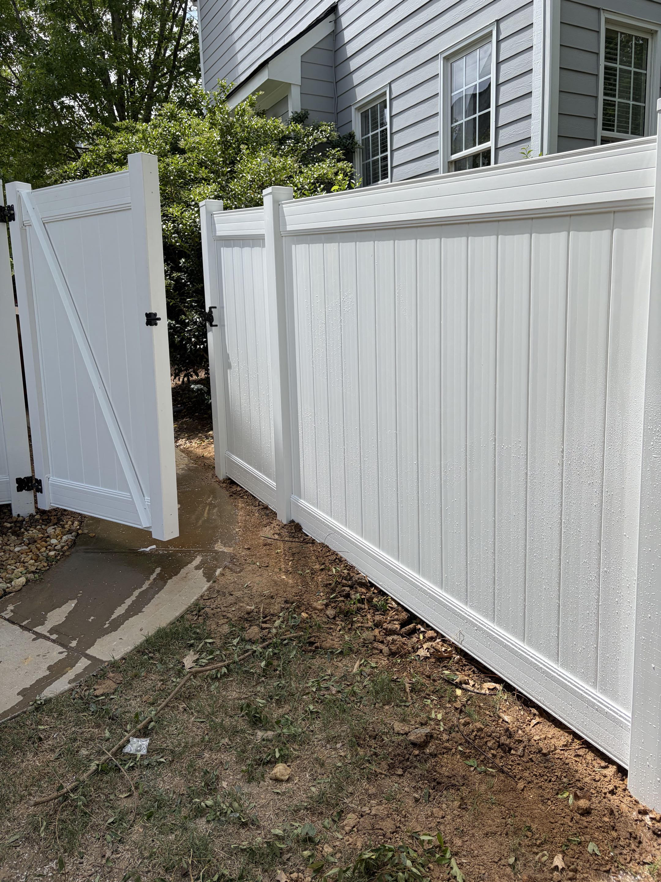 Cary, NC - Completed 150’ of wood fence demolition and replaced with 150’ of 6’ high vinyl fence for a safe, secure backyard for kids and dogs. Built for durability, we use wider rails and set posts 3’ deep with 80 lbs of concrete per post for maximum strength and stability. This low-maintenance vinyl fence adds long-lasting protection, clean curb appeal, and peace of mind for the whole family.