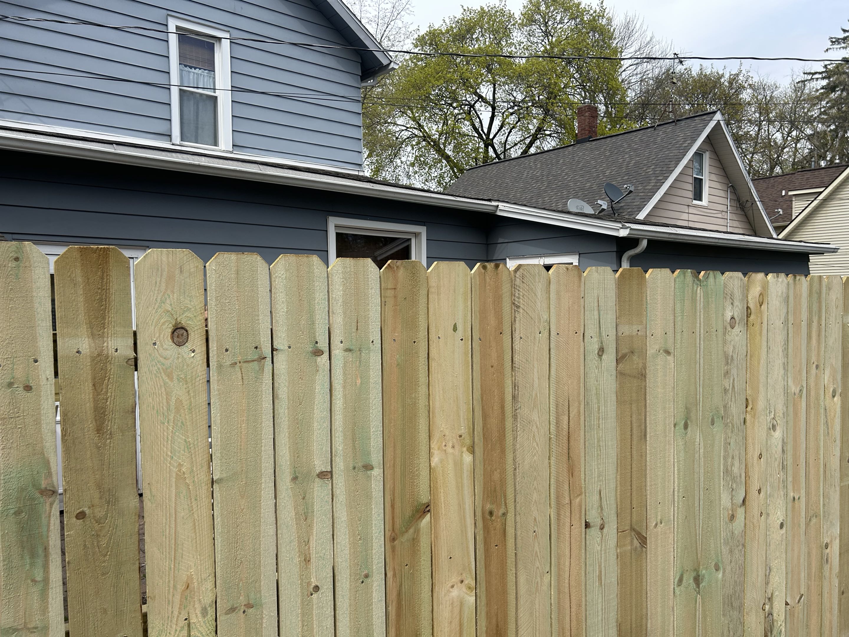 Chelsea, MI - Top Rail Fence Ann Arbor is in Chelsea Michigan. We just completed this beautiful wood privacy fence in the heart of Chelsea.  