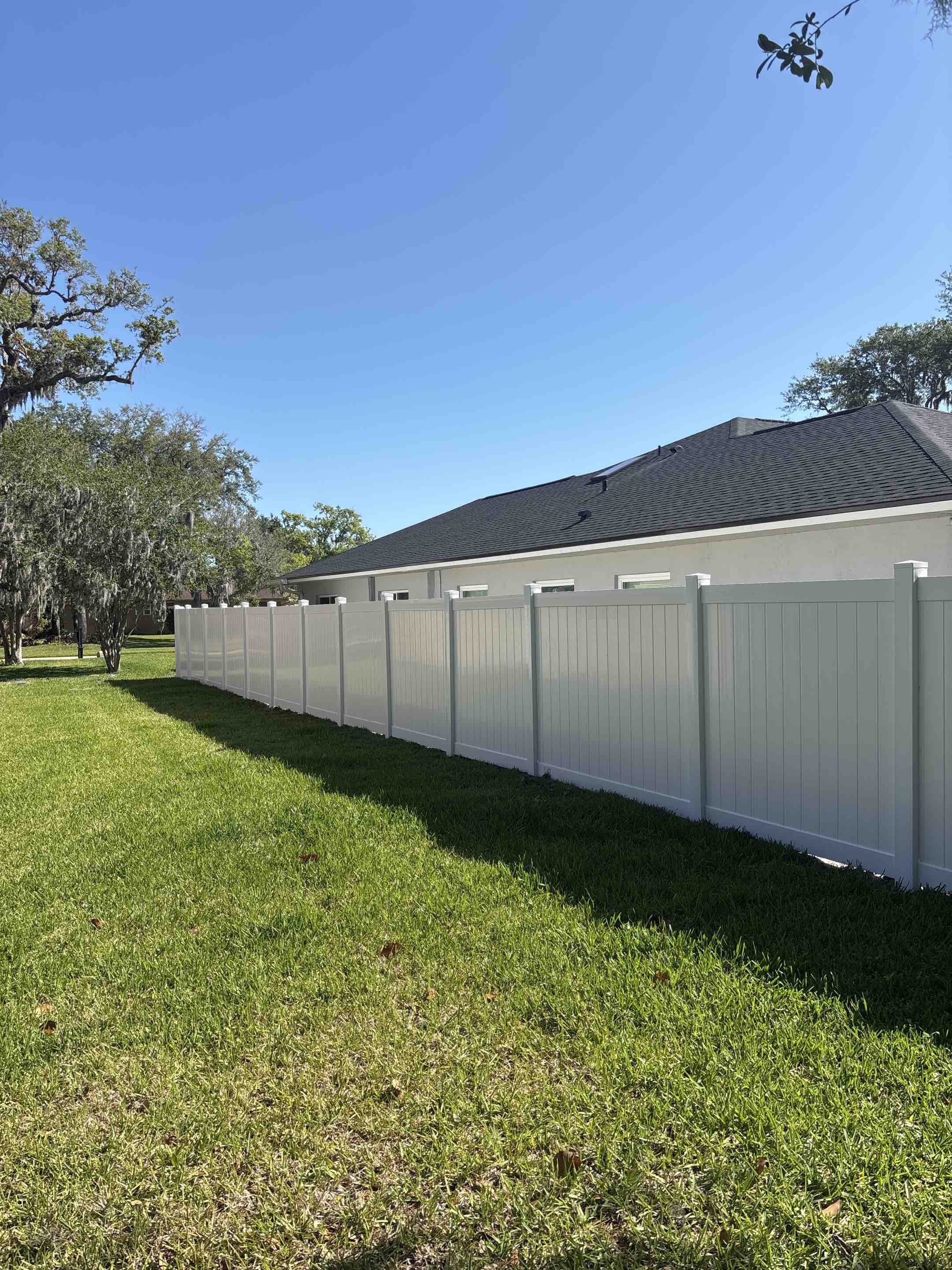 Port Orange, FL - Recently installed 6’ white privacy vinyl fence in port orange
