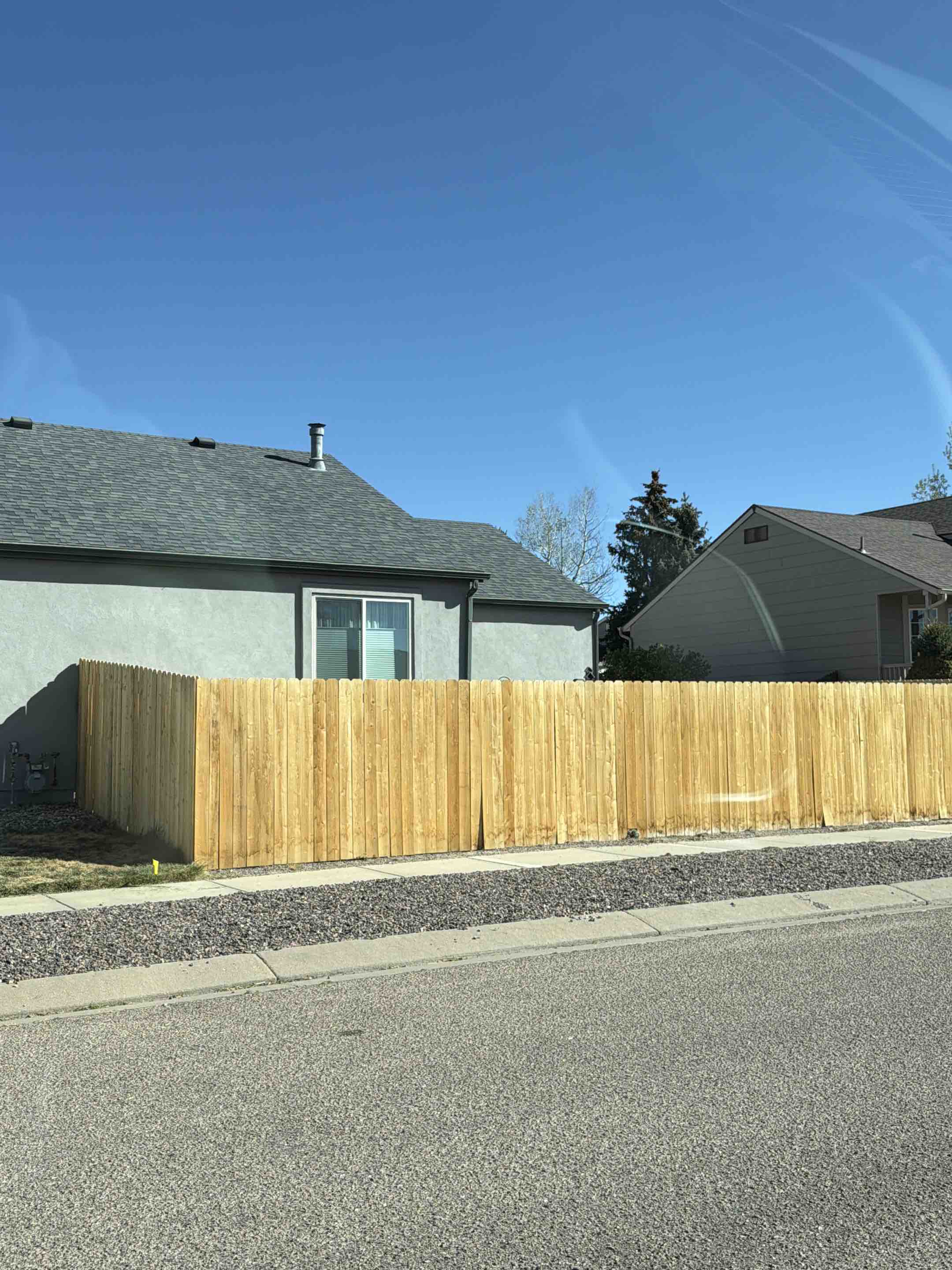 Colorado Springs, CO - Top Rail Fence is in Colorado Springs doing estimates for Cedar Privacy Fences!