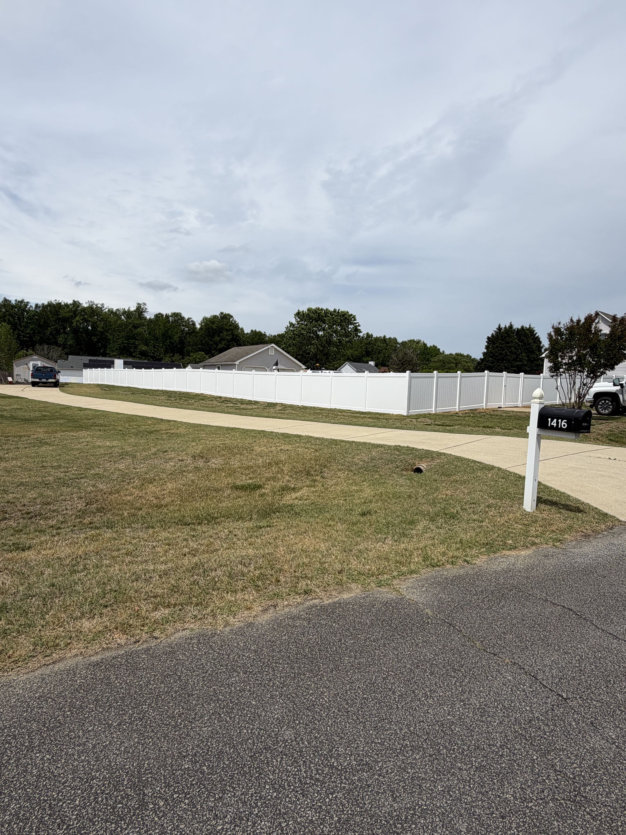 Raleigh, NC - Keep your kids and pets safe while they play outside with this 6-foot white vinyl privacy fence. Its solid design creates a secure, enclosed space with no gaps or splinters. Durable and low-maintenance, it resists weather and fading while adding a clean, modern look to your yard. A smart, long-lasting upgrade for family-friendly outdoor living. Top Rail Fence delivers peace of mind  for parents around the triangle!  