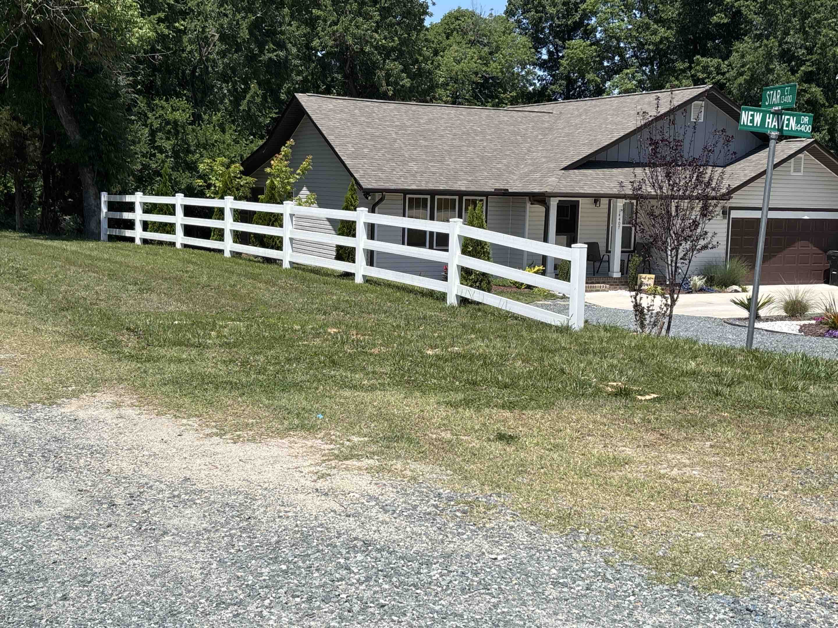 Huntersville, NC - 4 foot high vinyl three rail
