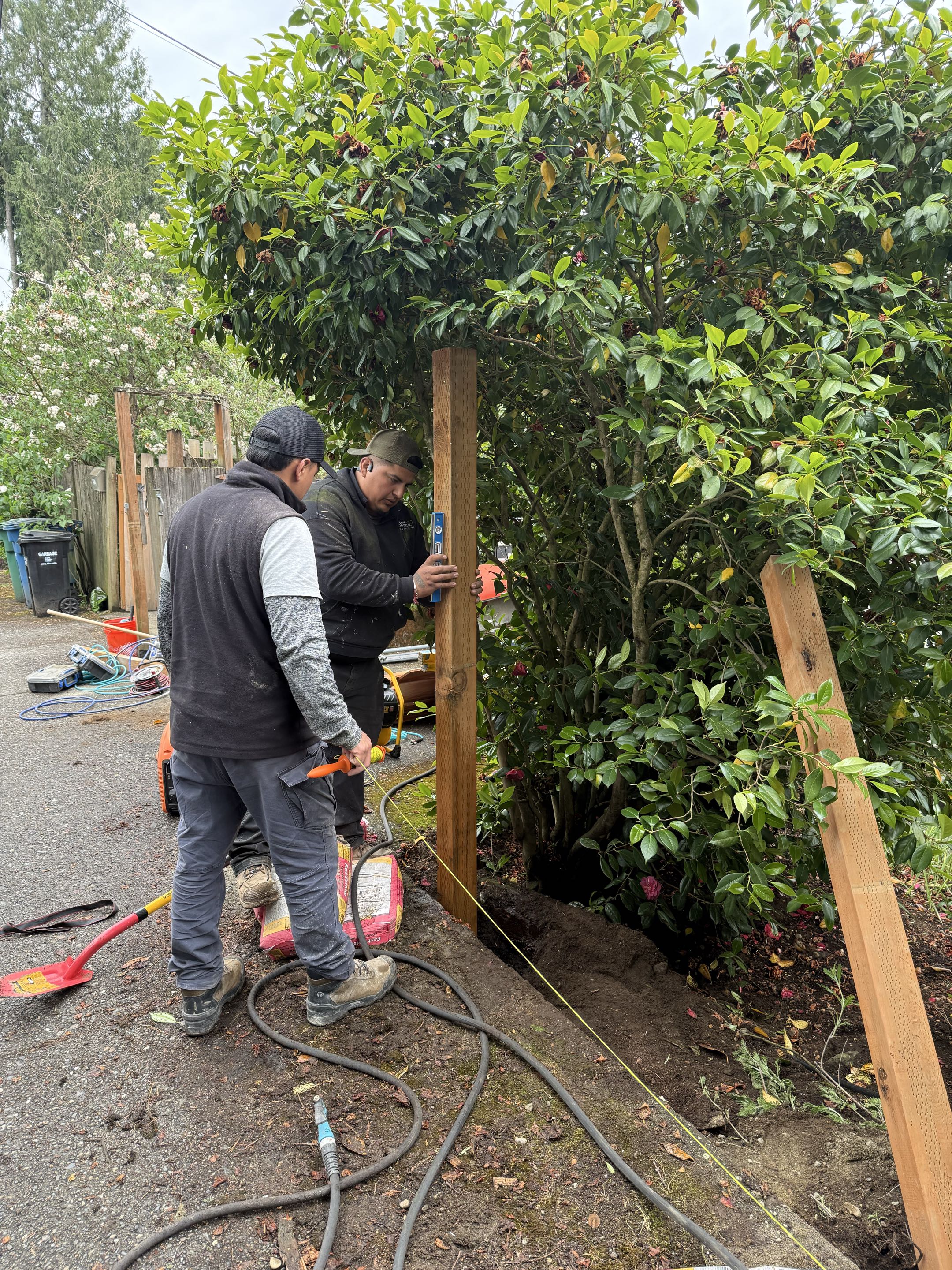 Seattle, WA - Starting a short fence with a rolling gate in Ravenna.