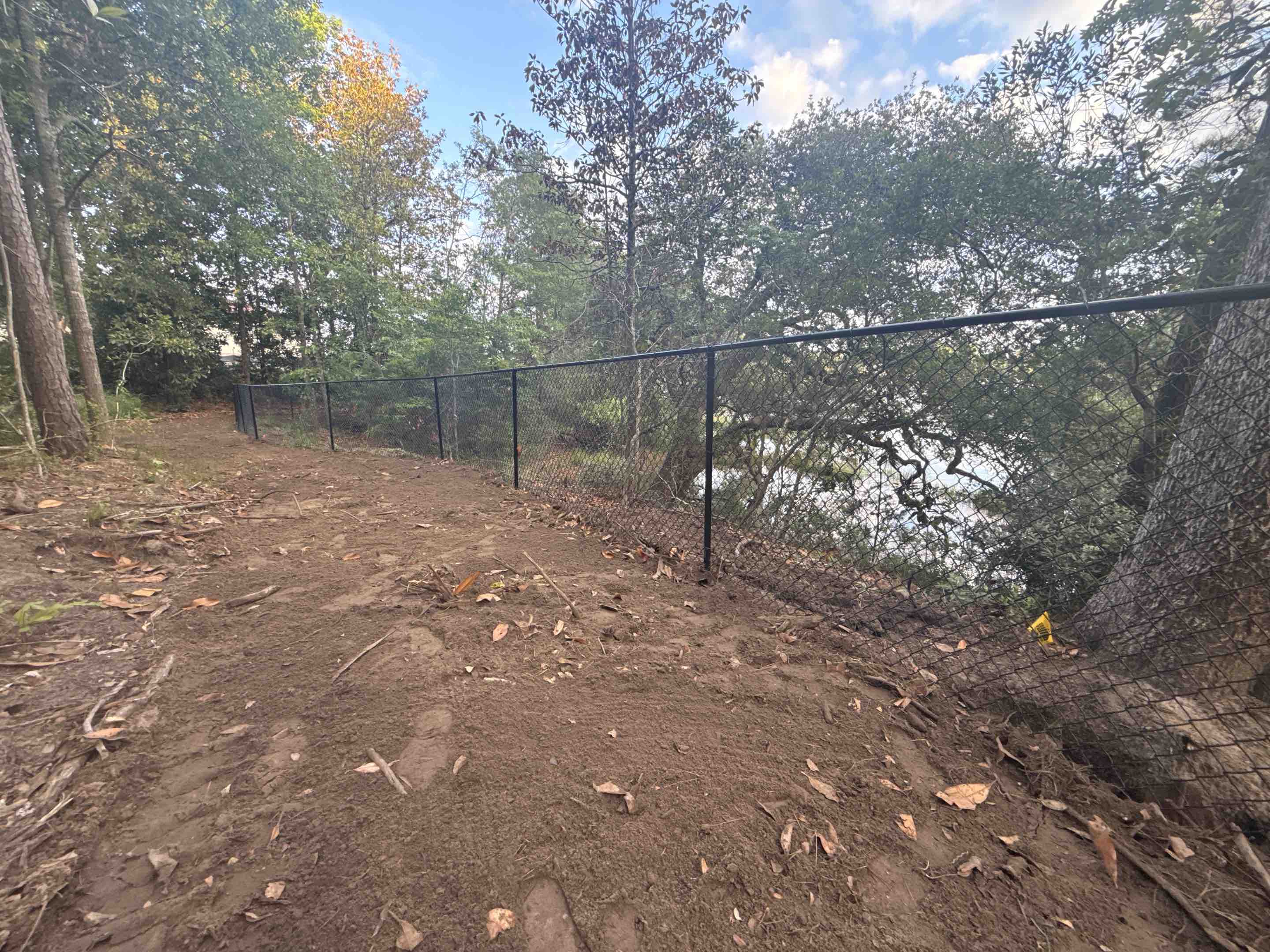Wilmington, NC - 2200ft of 5ft chainlink buried 1ft in the ground, amazing job Top Rail Team!! 