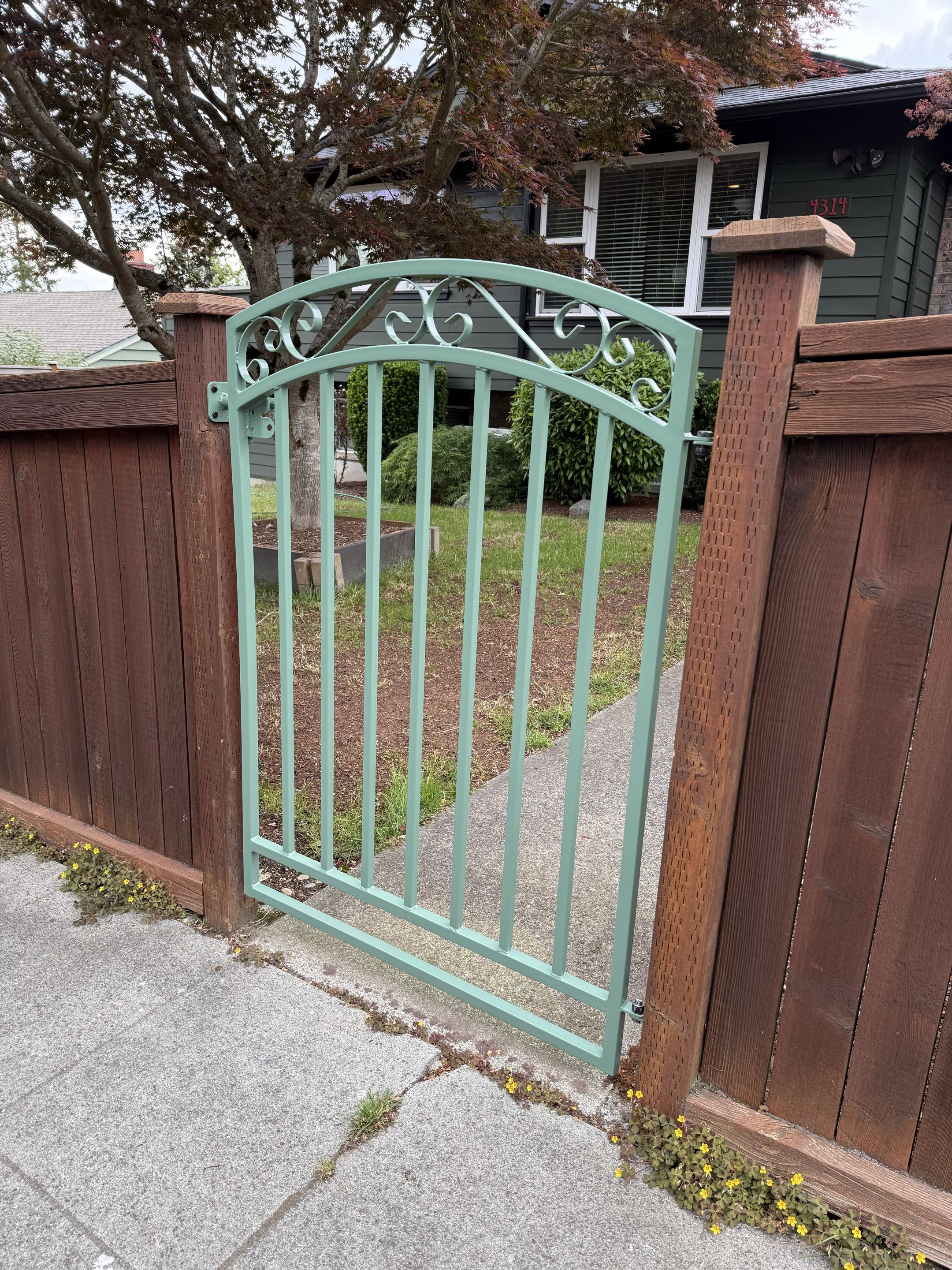 Seattle, WA - A new iron gate in west Seattle.