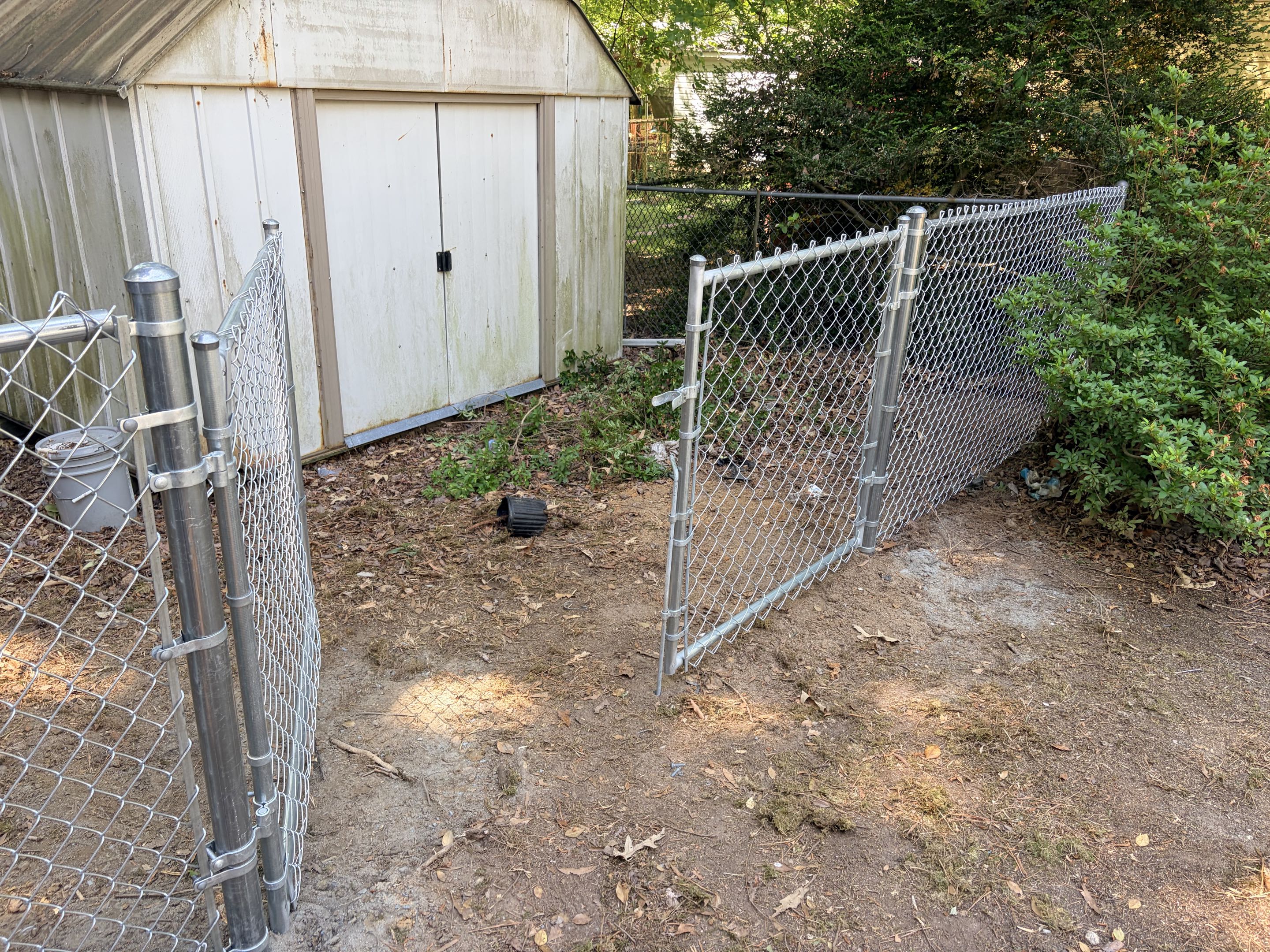 Knightdale, NC - We installed new sections of chain link fencing to ensure complete perimeter security. The old fencing had deteriorated significantly, so we replaced it with high-quality materials. Additionally, we installed one double gate and one single gate. Both gates were chosen for their durability and ease of use. The new installations were securely anchored and tested for functionality. This work enhances both the safety and aesthetics of the property.