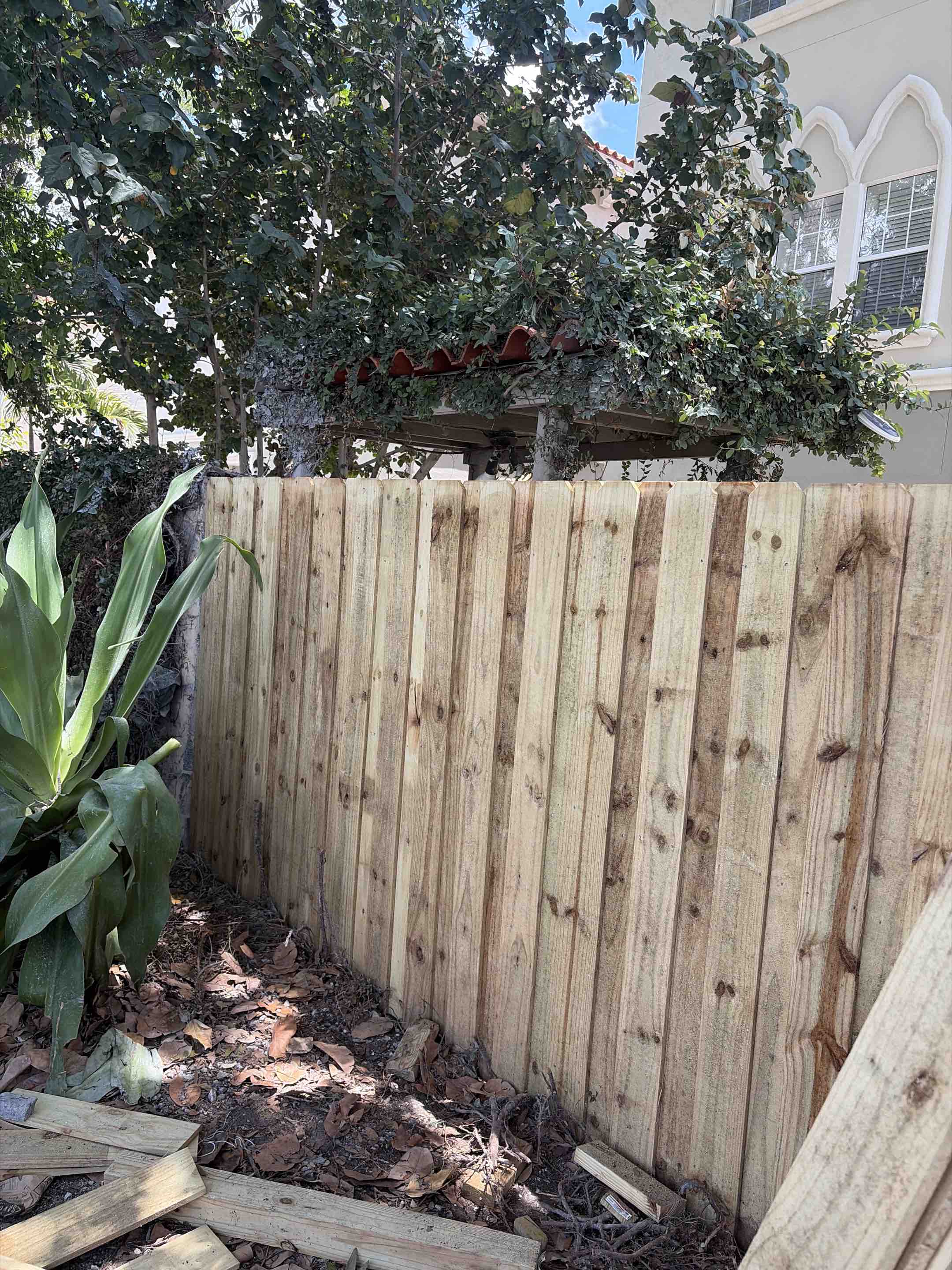 Tampa, FL - Our team meticulously designed and built a stunning wood fence that enhances the property's aesthetic appeal. We began by selecting high-quality, durable wood to ensure longevity and resistance to the elements. Each plank was carefully cut, sanded, and treated to prevent rot and decay. The fence was erected with precision, ensuring a straight and sturdy structure. We added decorative elements such as pickets and rails to provide both privacy and charm. The finishing touches included a protective stain that complements the natural beauty of the wood, adding an extra layer of protection. The result is a beautiful, functional fence that meets the client's needs and exceeds expectations.