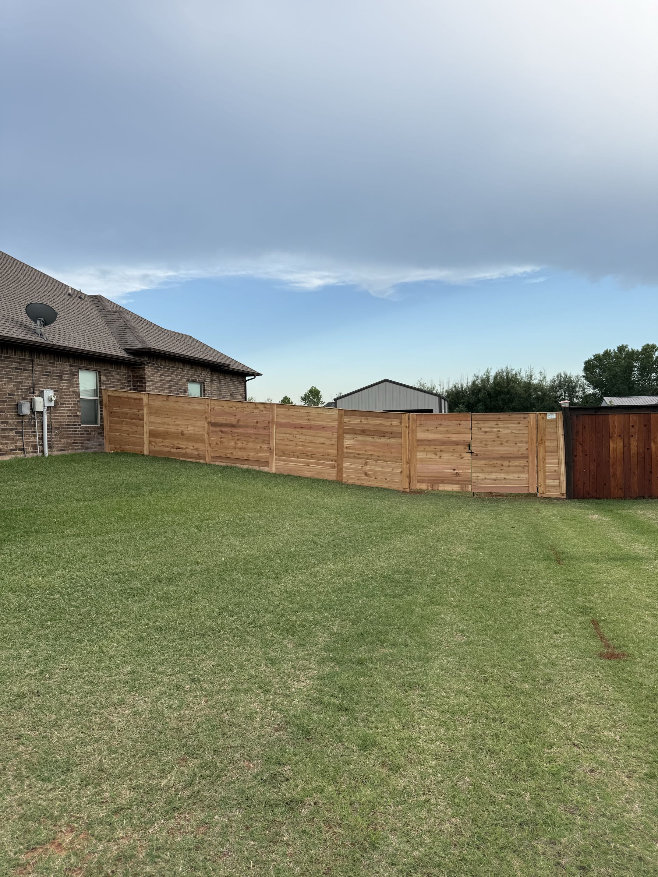 Edmond, OK - Nothing transforms a backyard quite like a custom horizontal cedar fence. This 6’ tall Western Red Cedar fence delivers a sleek, modern appearance with the natural beauty and durability cedar is known for. Proud to help bring this homeowner’s vision to life!