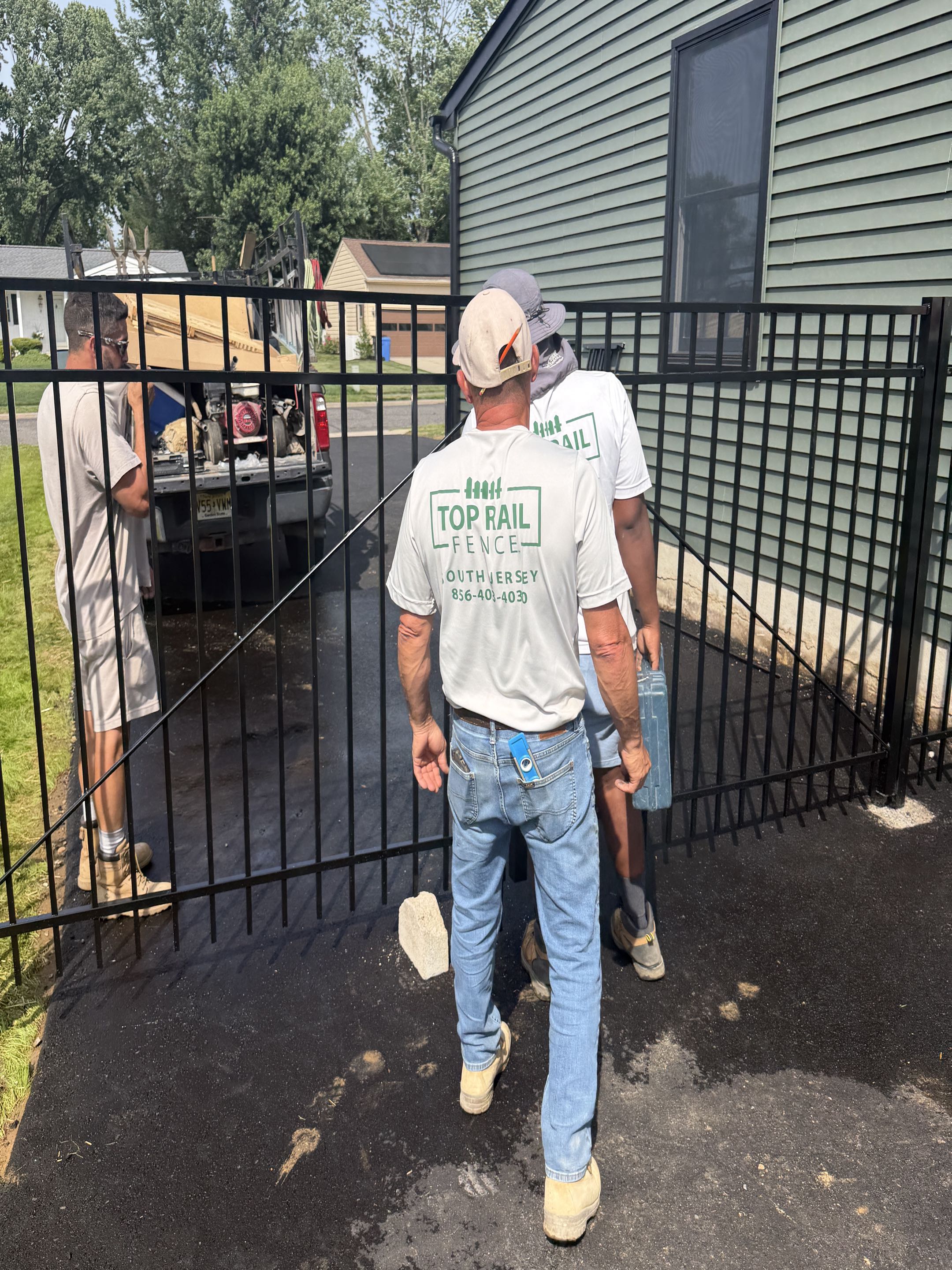 East Greenwich Township, NJ - Wrapping up another alumninum 5’ high fence job. This one includes a 10 foot wide double drive gate. 