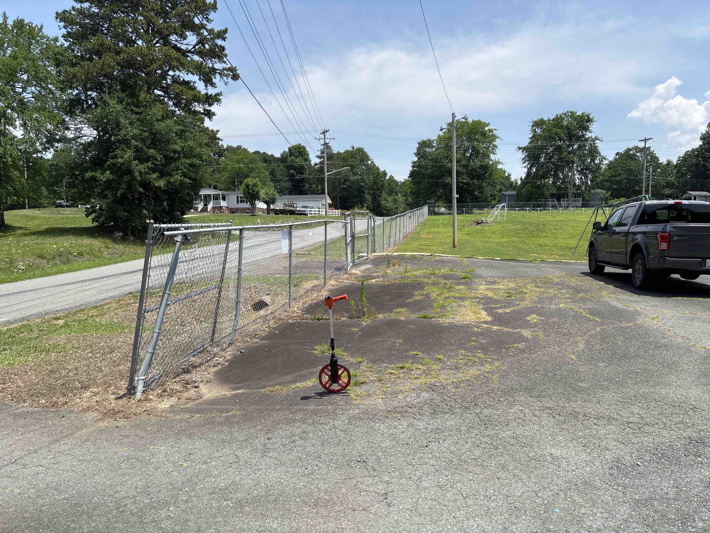 Concord, NC - Play chain-link with white split rail