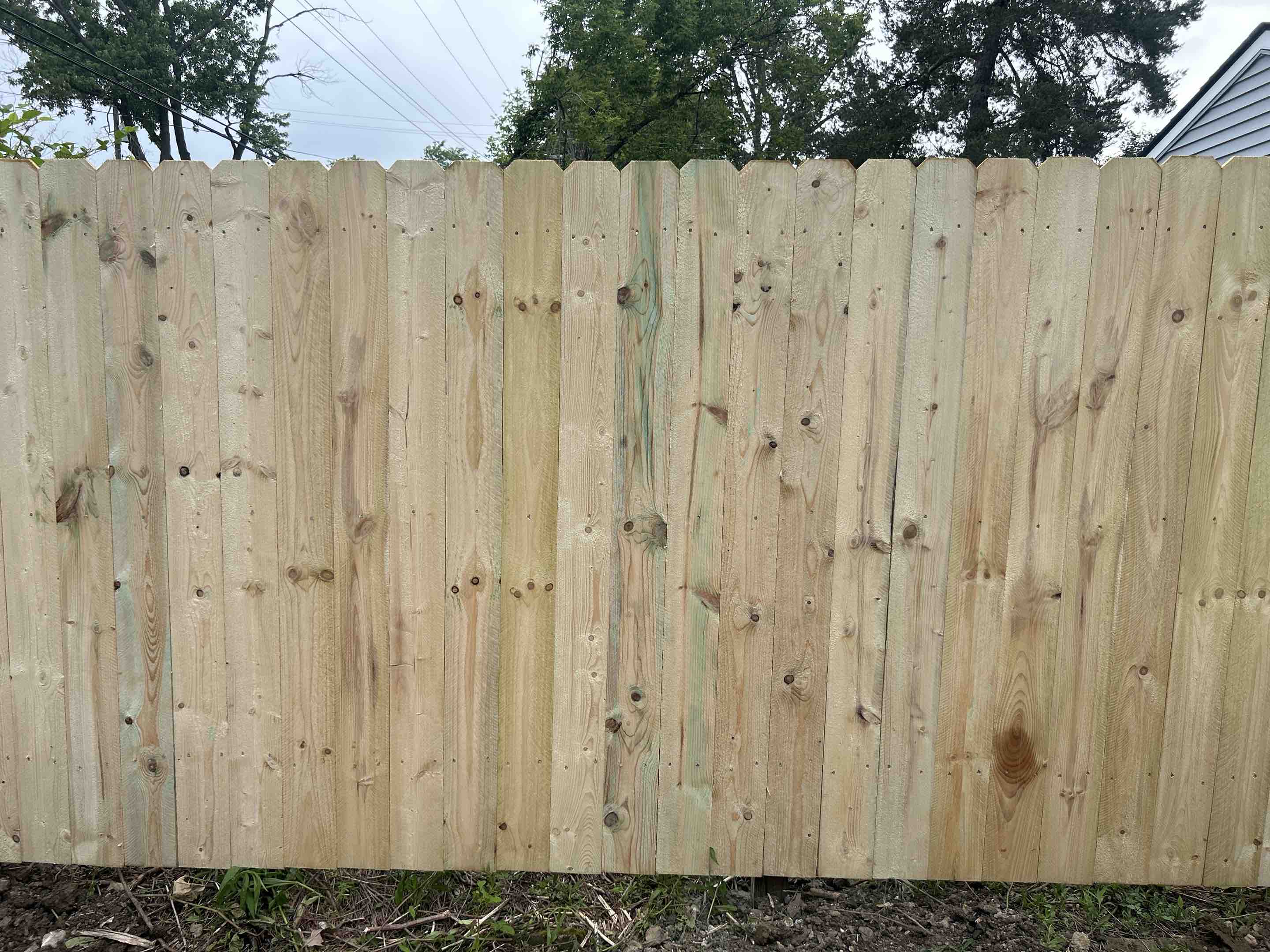 Ann Arbor, MI - Top Rail Fence is near Platt Road in Ann Arbor. We are putting up a classic Wood dog ear picket fence with Wood from nearby Chelsea Lumber.  