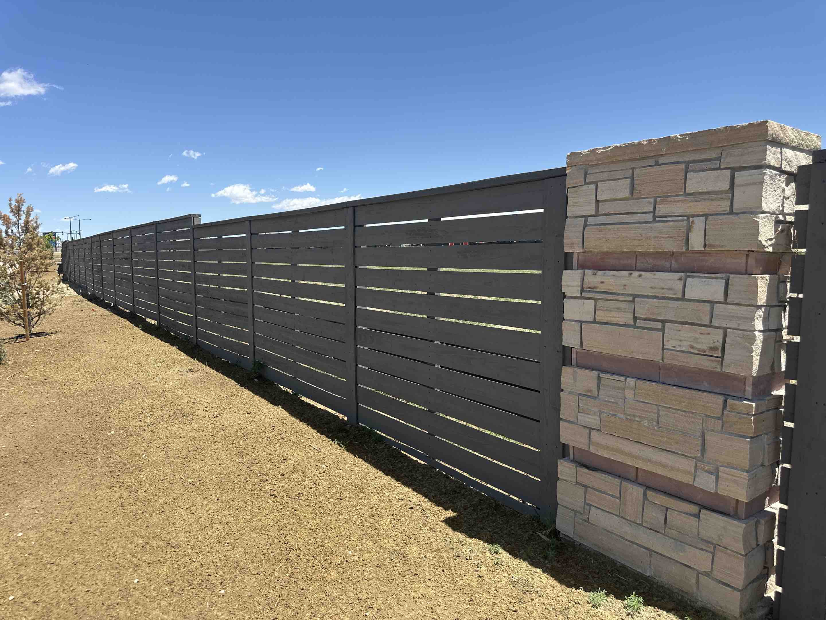 Loveland, CO - 6 foot tall, horizontal cap and trim with 1 inch picket Spacing.  This project is located at the Kingston community in loveland, Colorado
