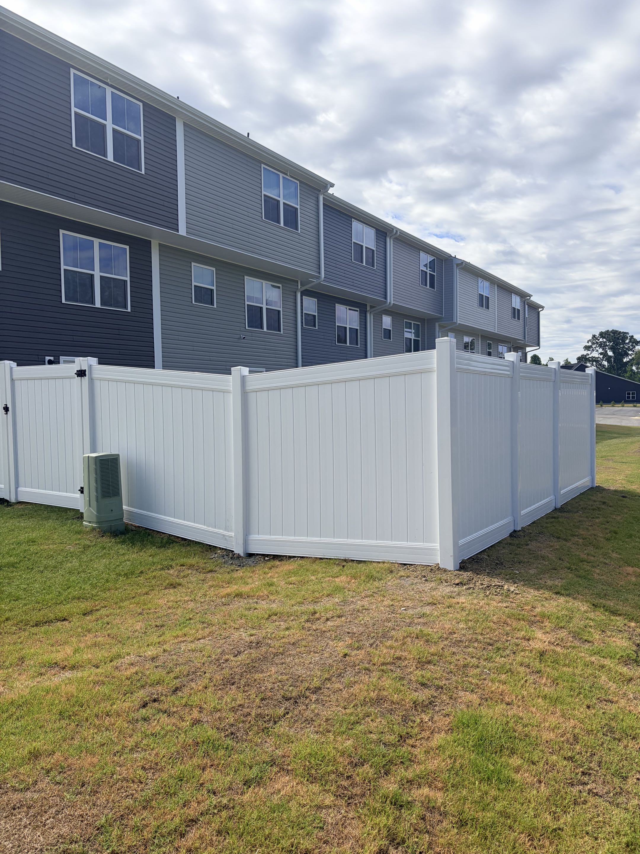 Raleigh, NC - A townhouse was in urgent need of a privacy solution, and we delivered a sleek white vinyl fence to meet this requirement. The fence was meticulously designed to provide the necessary seclusion while enhancing the property's curb appeal. The installation process involved securing the posts firmly into the ground and attaching the panels with precision. The final result is a robust, elegant fence that not only offers privacy but also adds a touch of sophistication to the property.