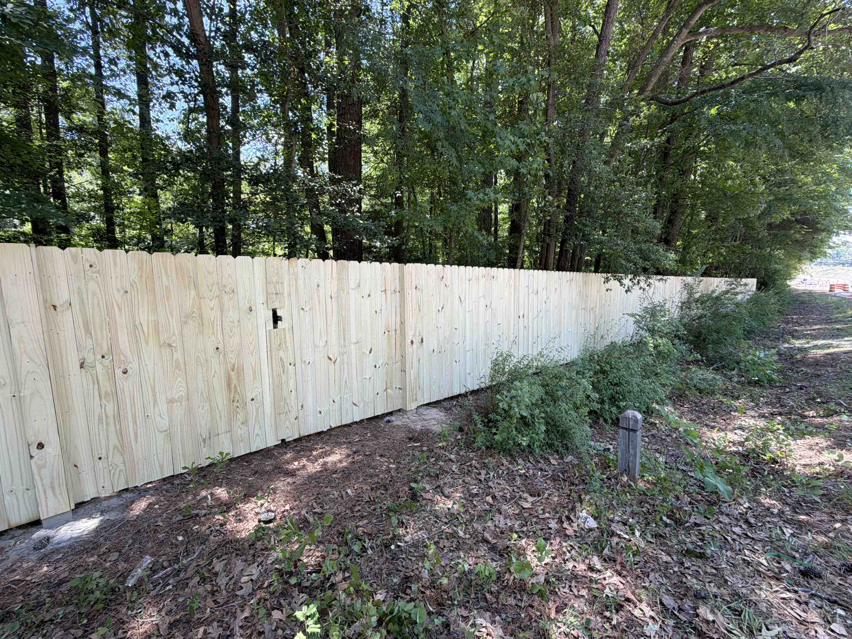 Wake Forest, NC - Need a 160’ x 6h dog-eared wood privacy fence with a double gate? Secure your property with premium craftsmanship from our woman-owned and veteran-owned local fence company. As the top-rated fence builders near you, we specialize in professional wood fence installation built to last. Enhance your backyard privacy today! Call the best local fence contractors nearby for a free quote. #WomanOwned #VeteranOwned #FenceInstallation #PrivacyFence #WoodFence #FenceBuildersNearMe