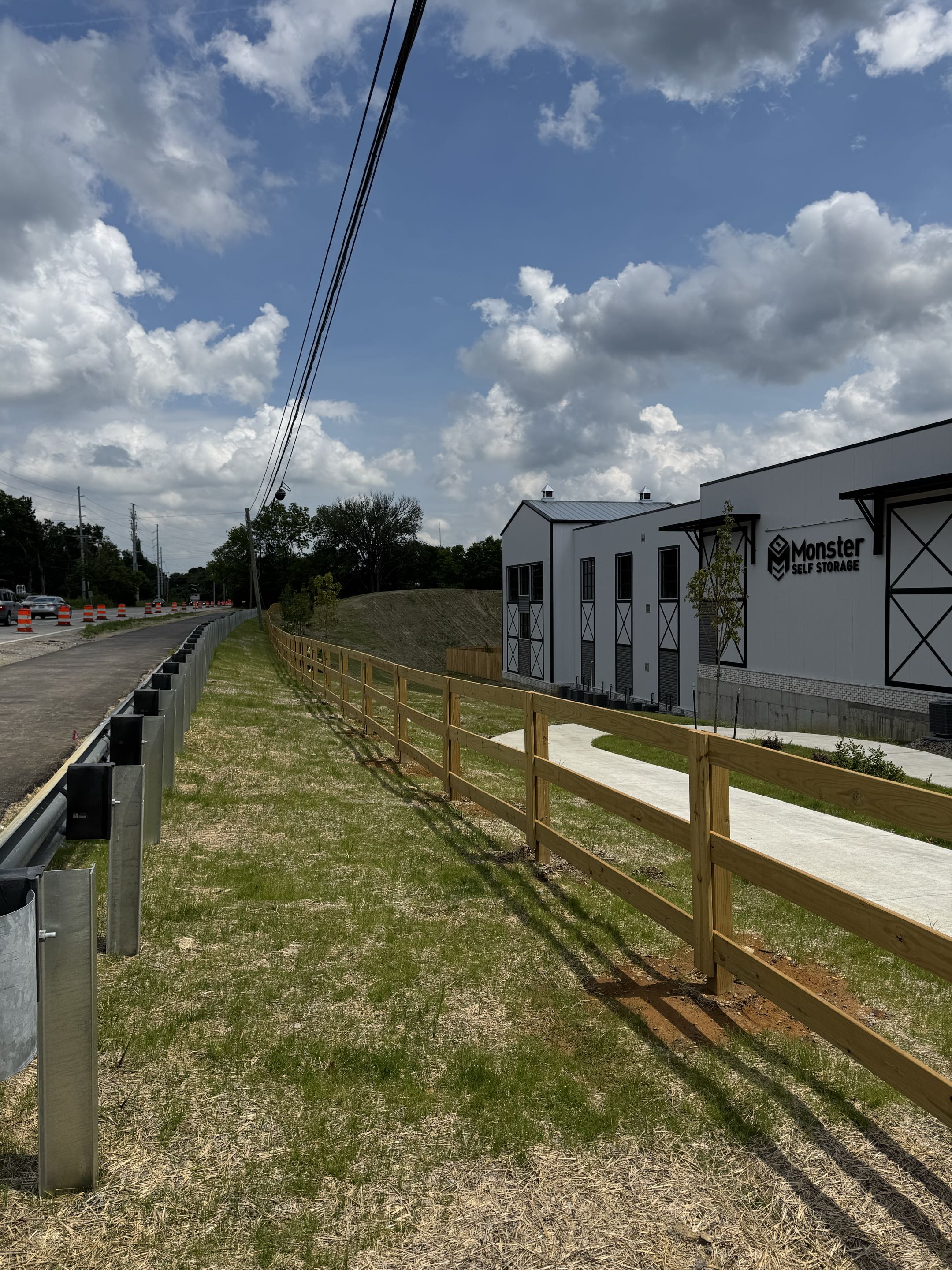 Louisville, KY - 4’ horse fence and 8’ wood privacy at new storage facility on Shelbyville Rd